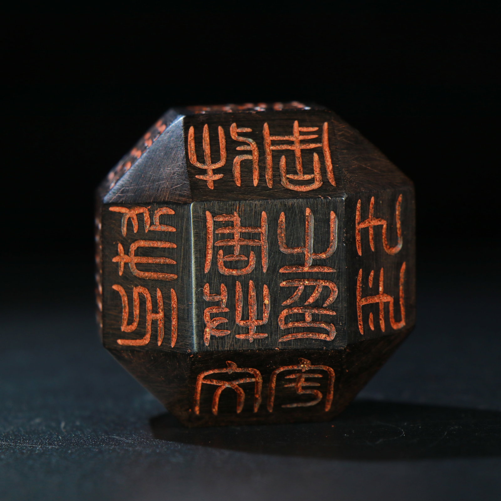 A FOUR-SIDED POLYPHON SEAL WITH COAL ESSENCE FROM THE NORTHERN ZHOU DYNASTY
