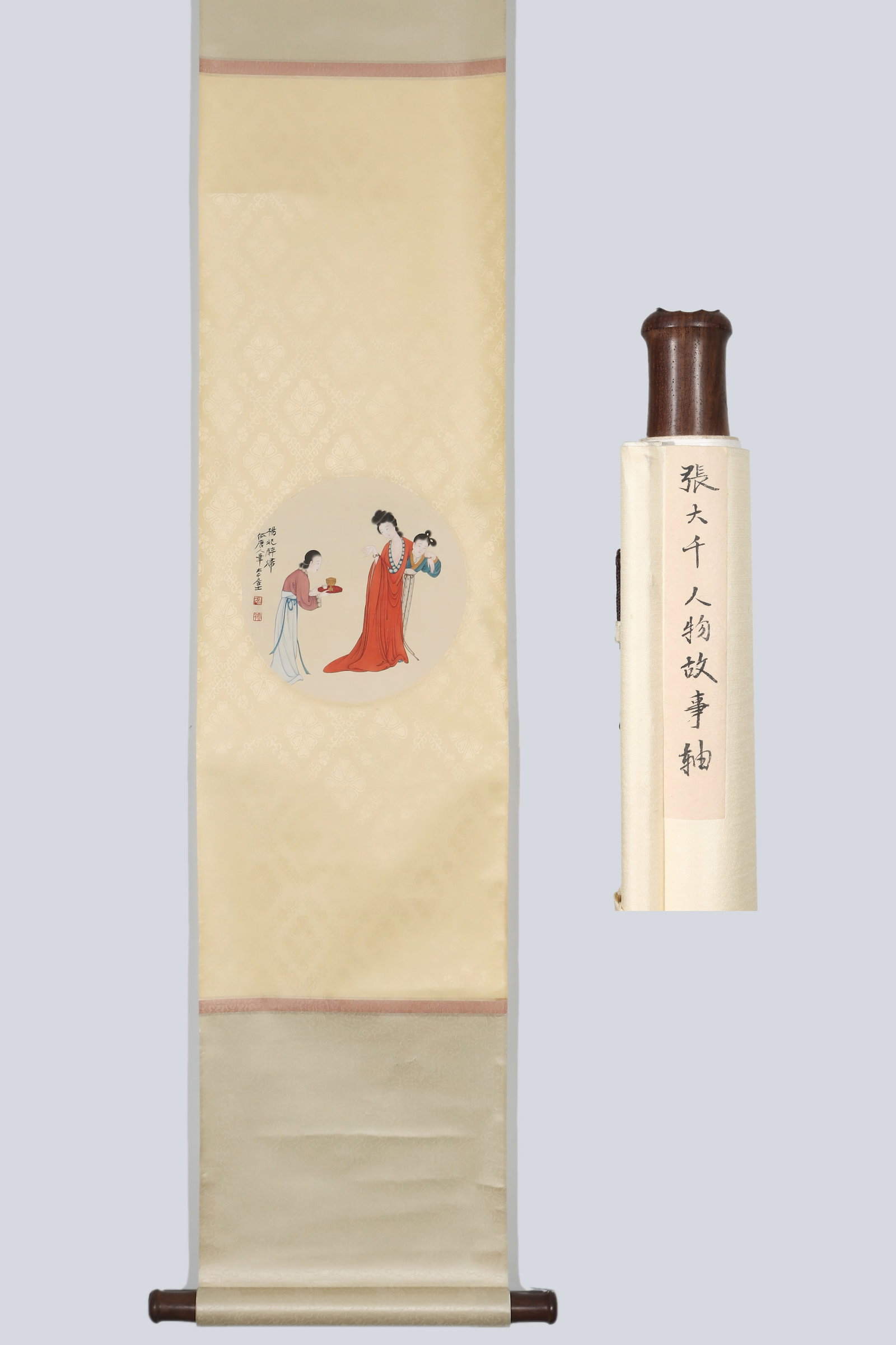 ZHANG DAQIAN (1899-1983) CHARACTER STORIES: D:23cm(9.06in)Color figure painting on silk. The work depicts noble lady in red robe with two waiting maids. Rendered in elegant meticulous strokes inspired by ancient Tang & Song figure art. Inscript