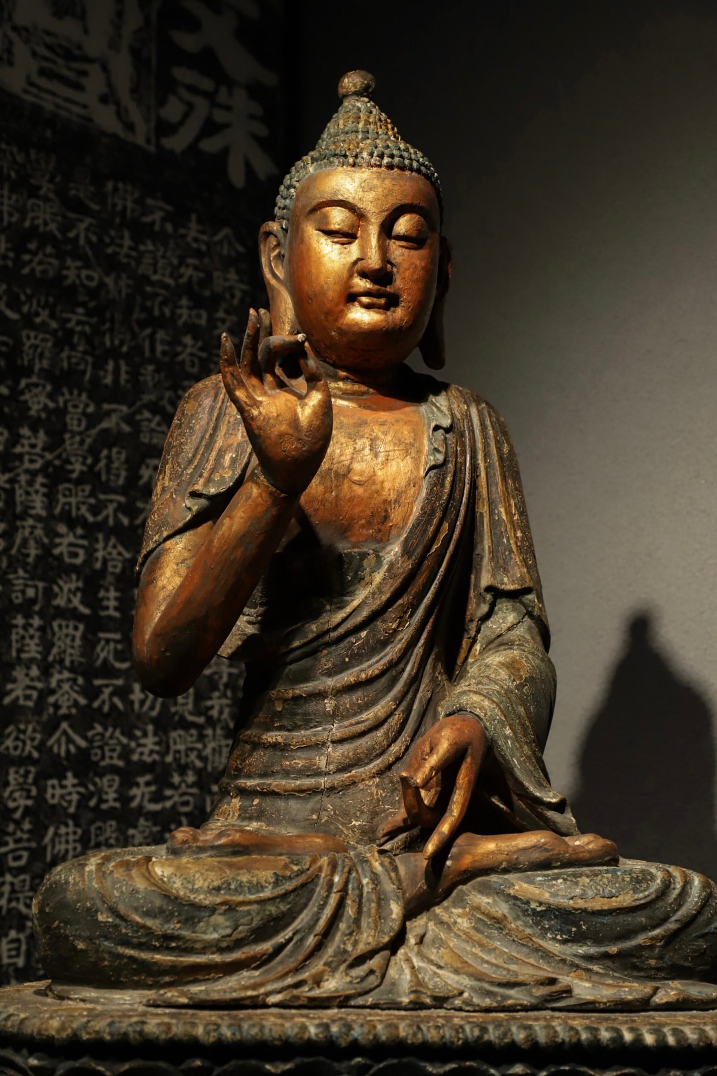 A SONG DYNASTY CAMPHOR WOOD STATUE OF SAKYAMUNI BUDDHA: H:81cmL:55cmW:41cm