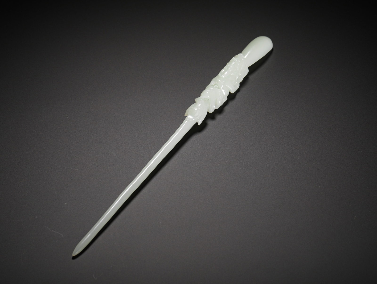 QING DYNASTY HETIAN WHITE JADE LOTUS POND LOTUS PATTERN JADE HAIRPIN: Long:26cm(10.24in) Weight:50g(0.11lb)Hetian white jade hairpin with lotus pond carving, Qing Dynasty.Carved integrally from a single jade block, creamy fine white jade with soft oily surface patina.Th