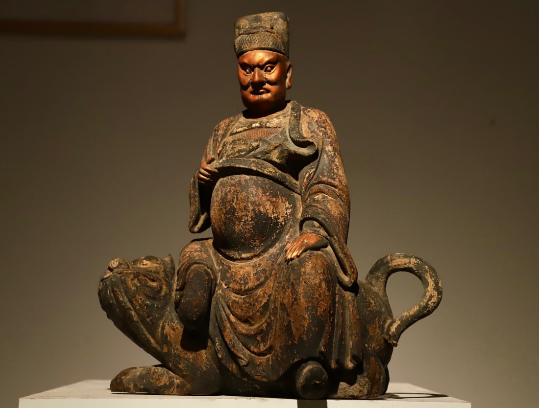 A WOODEN STATUE OF ZHAO GONGMING FROM THE SONG DYNASTY