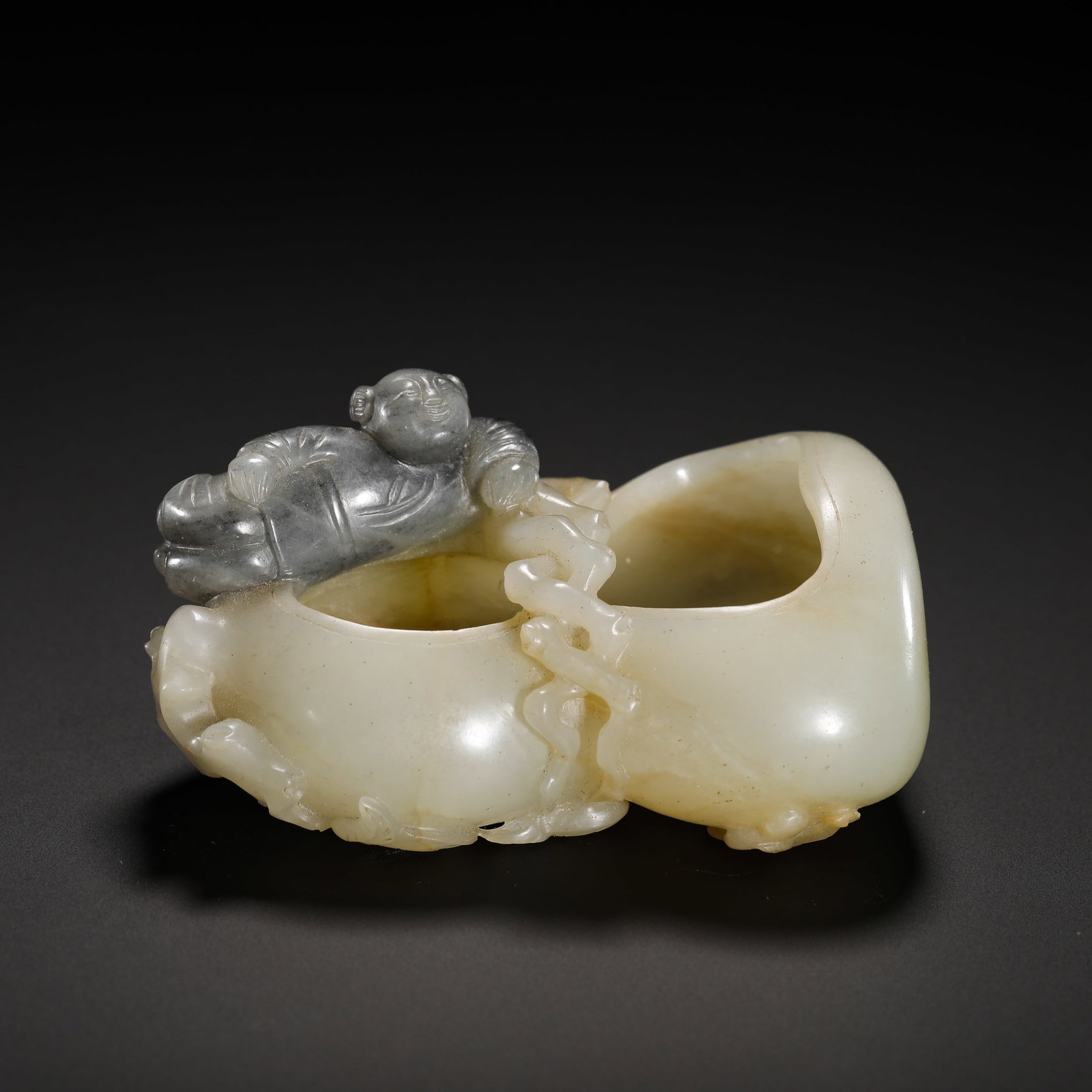 QING DYNASTY HETIAN JADE GOURD DOUBLE WATER BASIN: Height:5.5cm(2.17in) Width:7.5cm(2.95in) Weight:90g(0.20lb)Hetian white jade dual-gourd brush washer with natural grey-black jade boy, Qing Dynasty.Crafted from two-tone jade with clever color separat