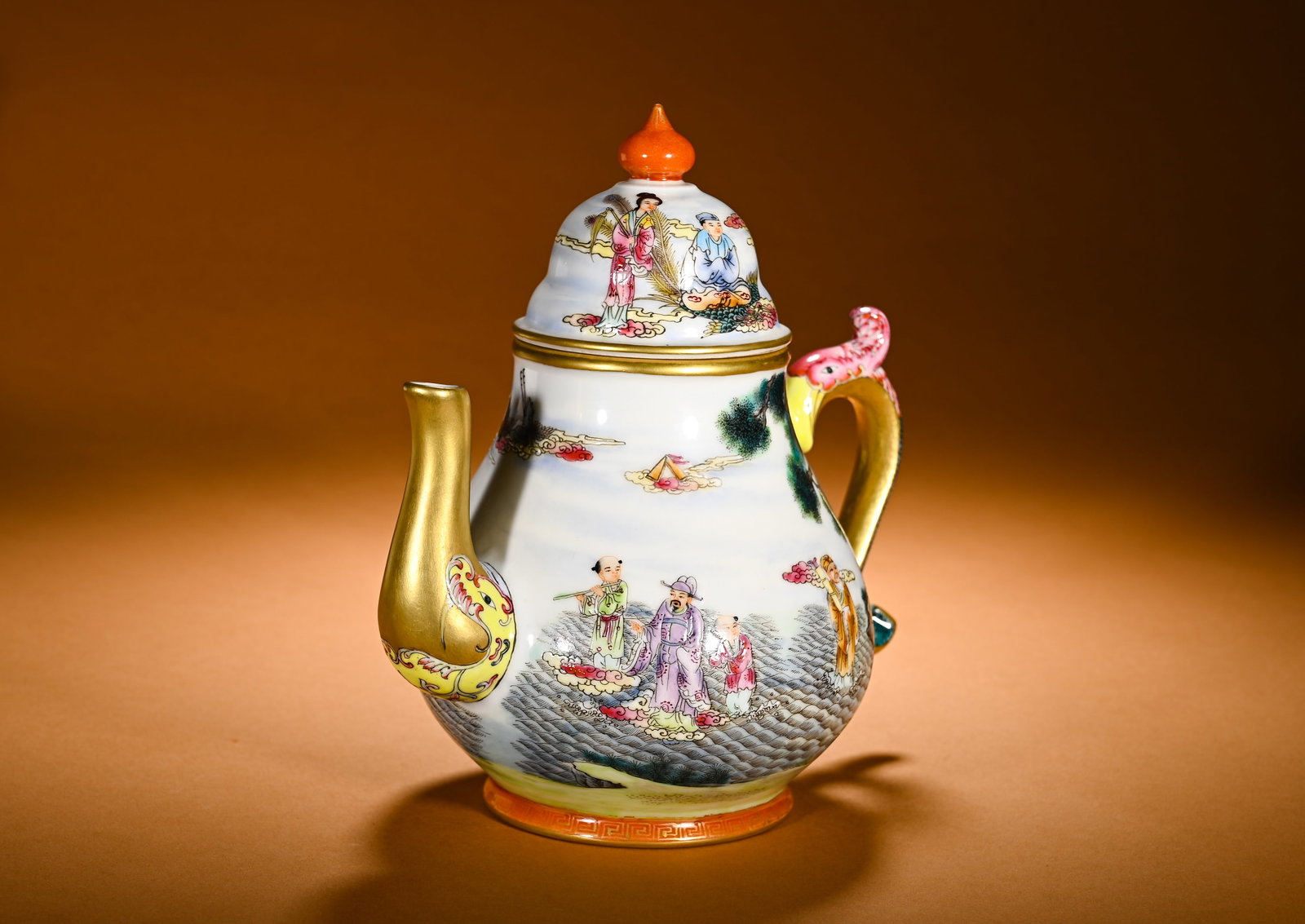 QING DYNASTY POLYCHROME DECORATIVE EIGHT IMMORTALS CROSSING THE SEA PATTERN DRAGON AND PHOENIX HEAD: Height:21cm(8.27in)Width:20cm(7.87in)Weight:890g(1.96lb)Famille rose covered teapot with Eight Immortals crossing the sea landscape and phoenix-dragon gilt spout & handle. Pear-shaped body with pearl 