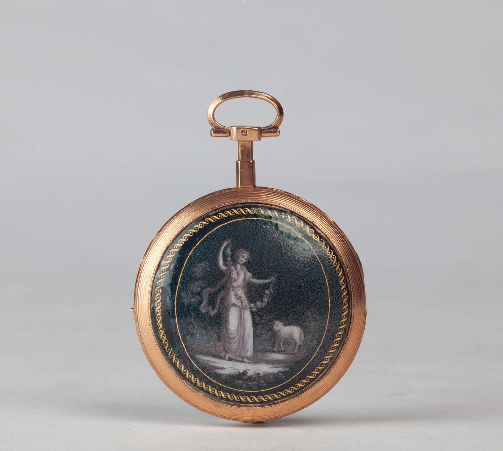 14K gold pocket watch with enamel painting of a shepherdess, France, 1780: Dial Signature: ROMAN, MELLY & ROUXMovement Signature: Roman, Melly & Roux à Constance N. 3076.Dimensions: Diameter 45mmRemarks: No key includedDescription: The pocket watch features a white enamel d