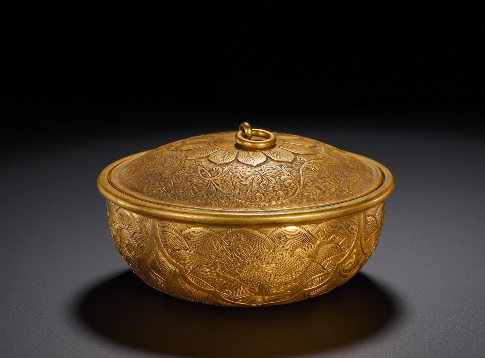 Tang Dynasty gilded copper engraved lotus pond fish transforming into dragon lid box: Height:7cm(2.76in), Diameter:15cm(5.91in), Weight:820g (1.808lb)