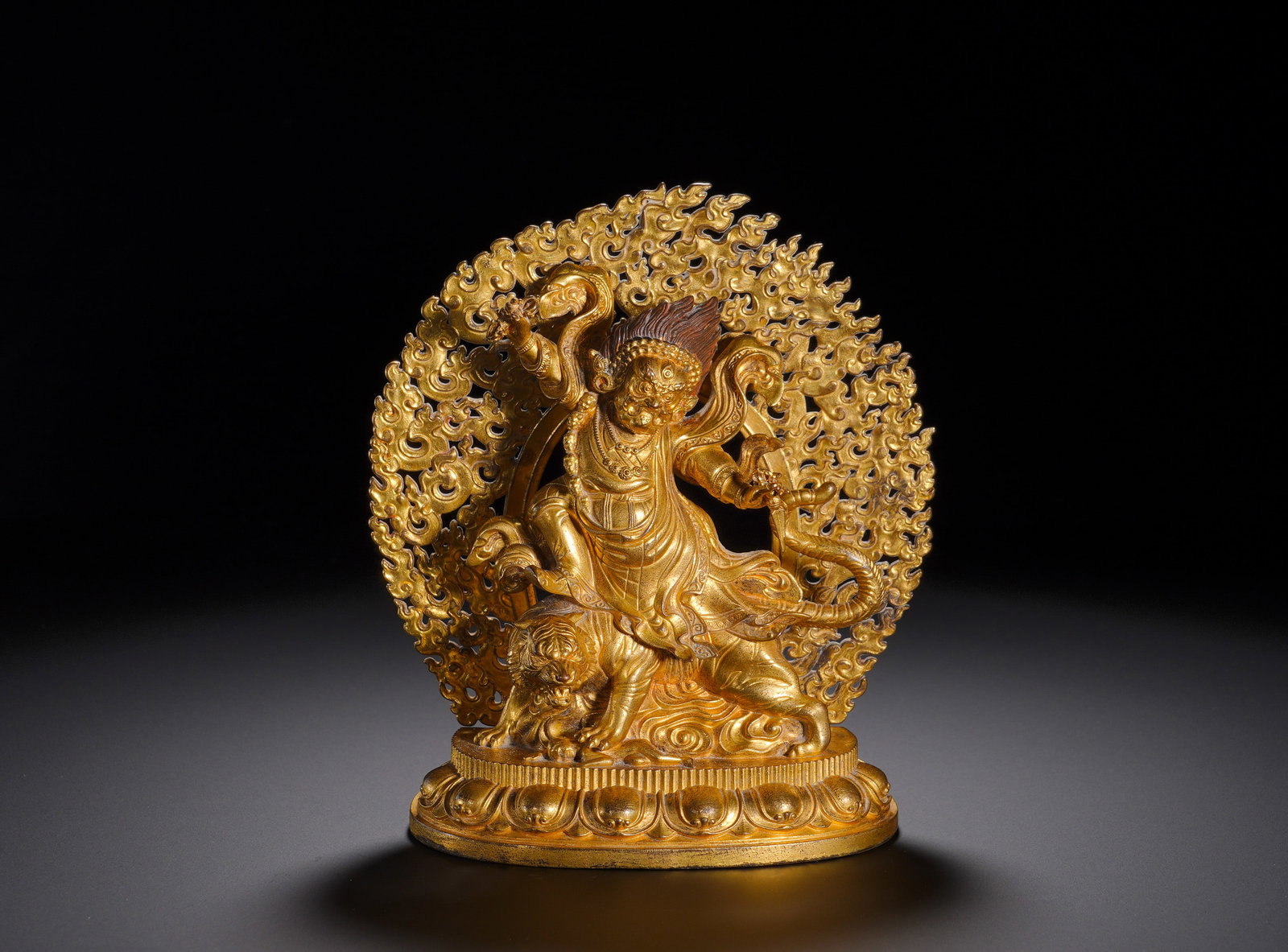 Qing Dynasty gilded bronze Padmasambhava on a Tiger (1 of 10)
