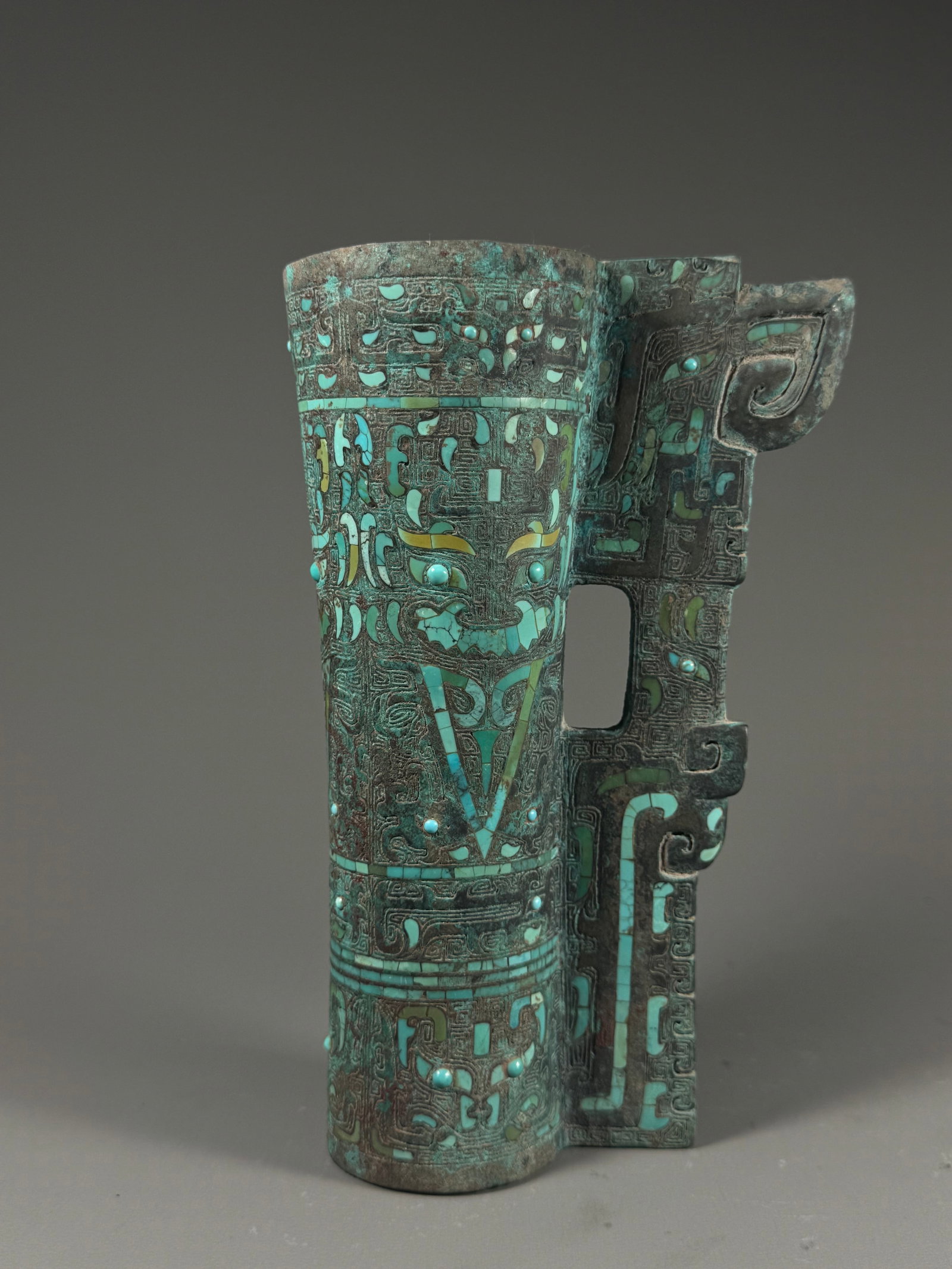 Bronze ? ornament inlaid with turquoise animal face pattern from the late shang period (1 of 7)