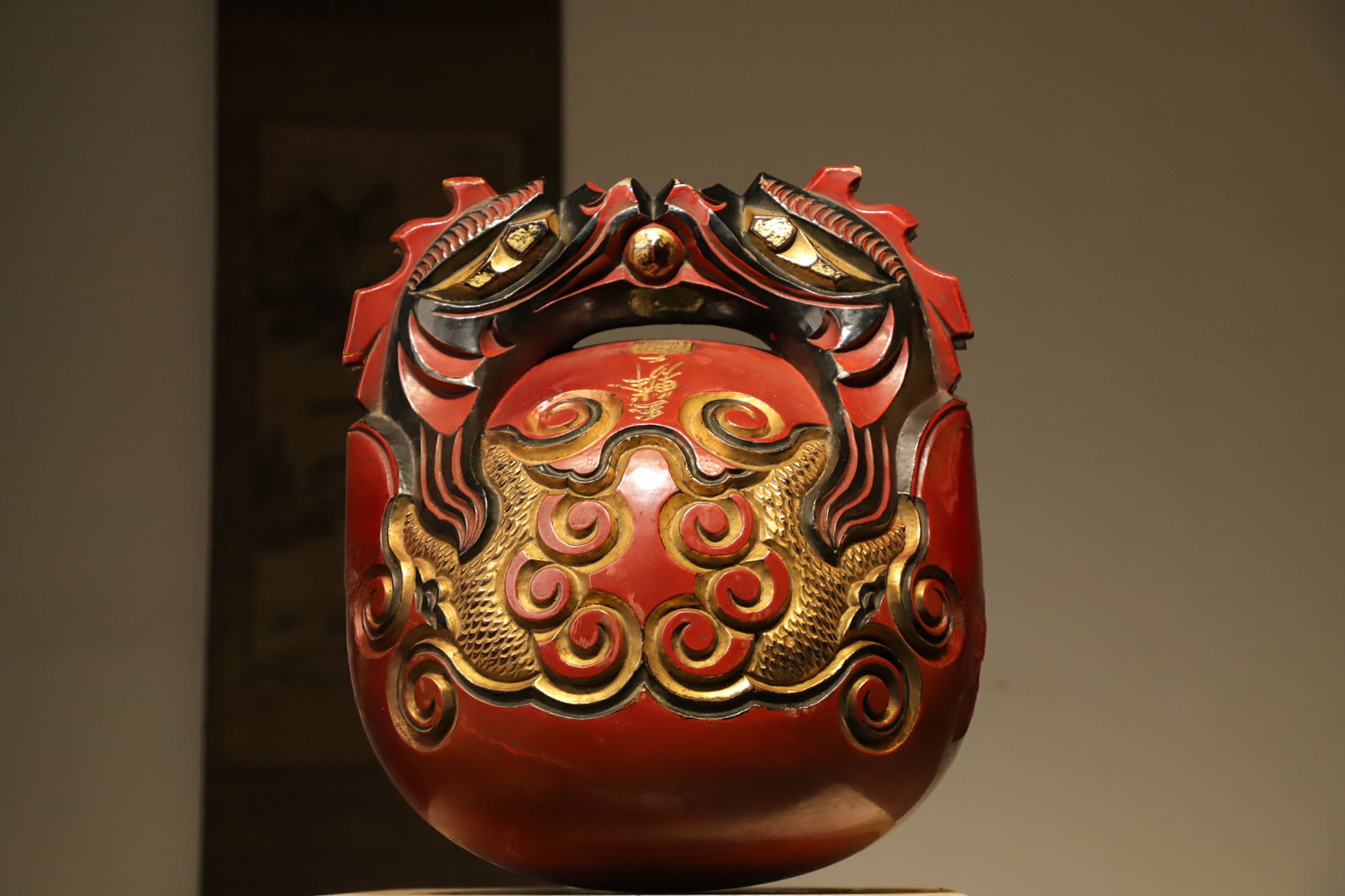 Qing Dynasty wood carvings with vermilion lacquer and gilded double dragons and wooden fish: Height:48cm(18.90in) Width:42cm(16.54in)Antique Ming-Qing wooden red lacquered wooden fish with gilded dragon carving, Buddhist percussion tool for meditation and salvation.