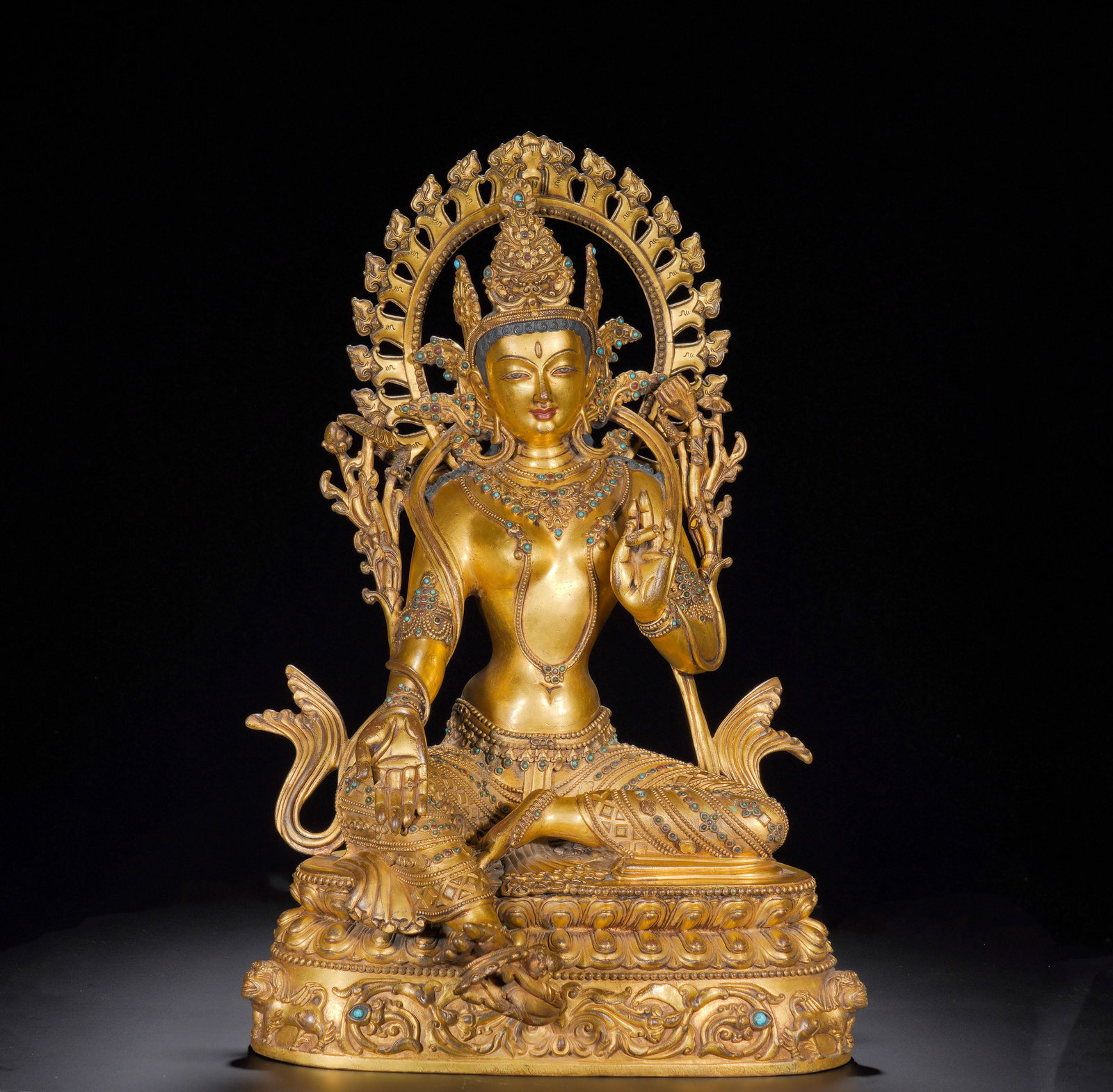 18th-century gilded bronze statue of the white Tara: Height:53cm(20.87in), Width:33cm(12.99in), Weight:10170g (22.421lb)This gilt bronze Green Tara sits in lalitasana upon a double-tier lotus throne, her right foot resting on a lotus blossom. She has a 