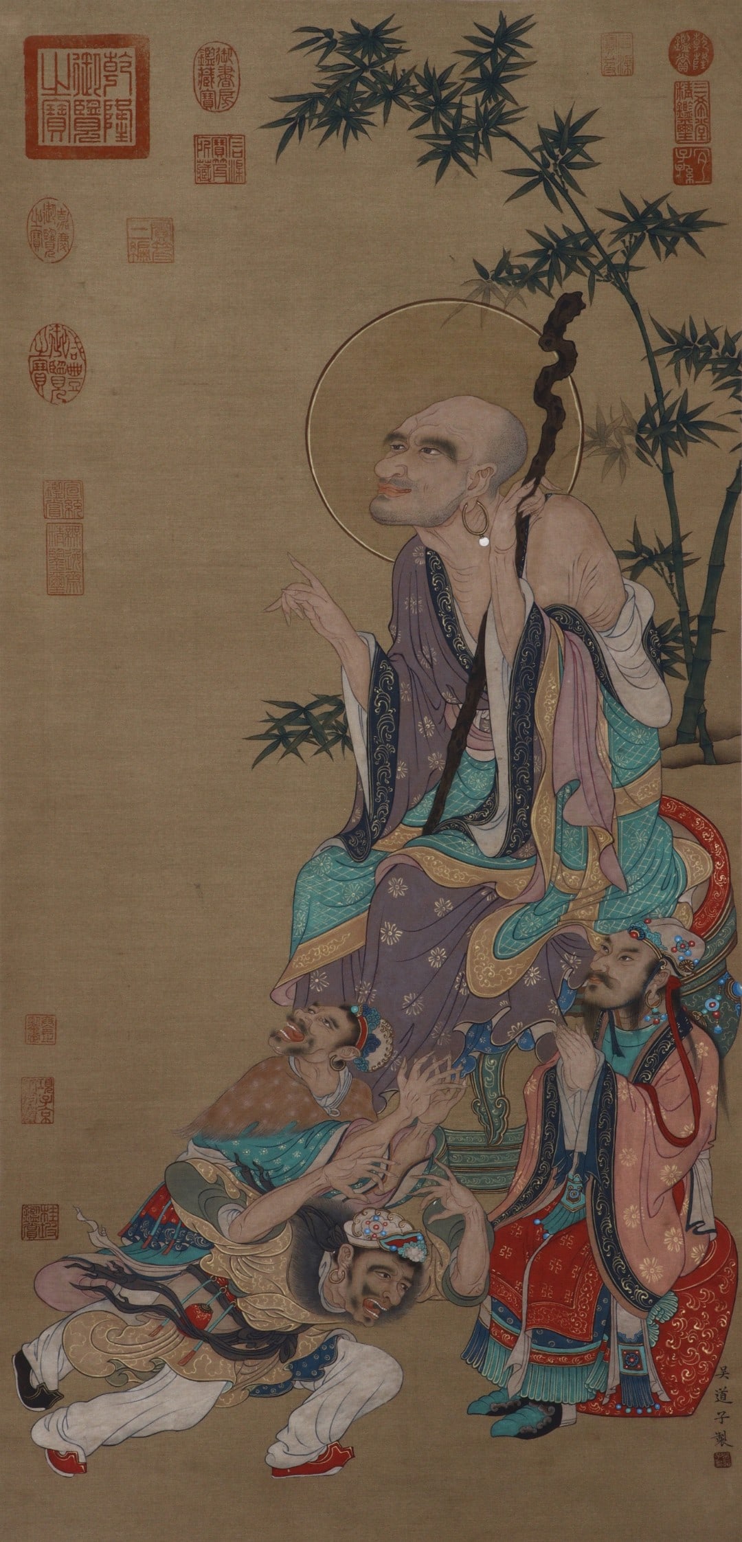 Tang Dynasty Wu Daozi (c. 680-759) Arhats Paying Homage to Buddha Standing Scroll: Height:100cm(39.37in), Width:48cm(18.90in)Hanging scroll, heavy colour painting on silk, attributed to Wu Daozi, the "Sage of Painting" of Tang Dynasty. Subject: Arhat receiving homage from foreign de