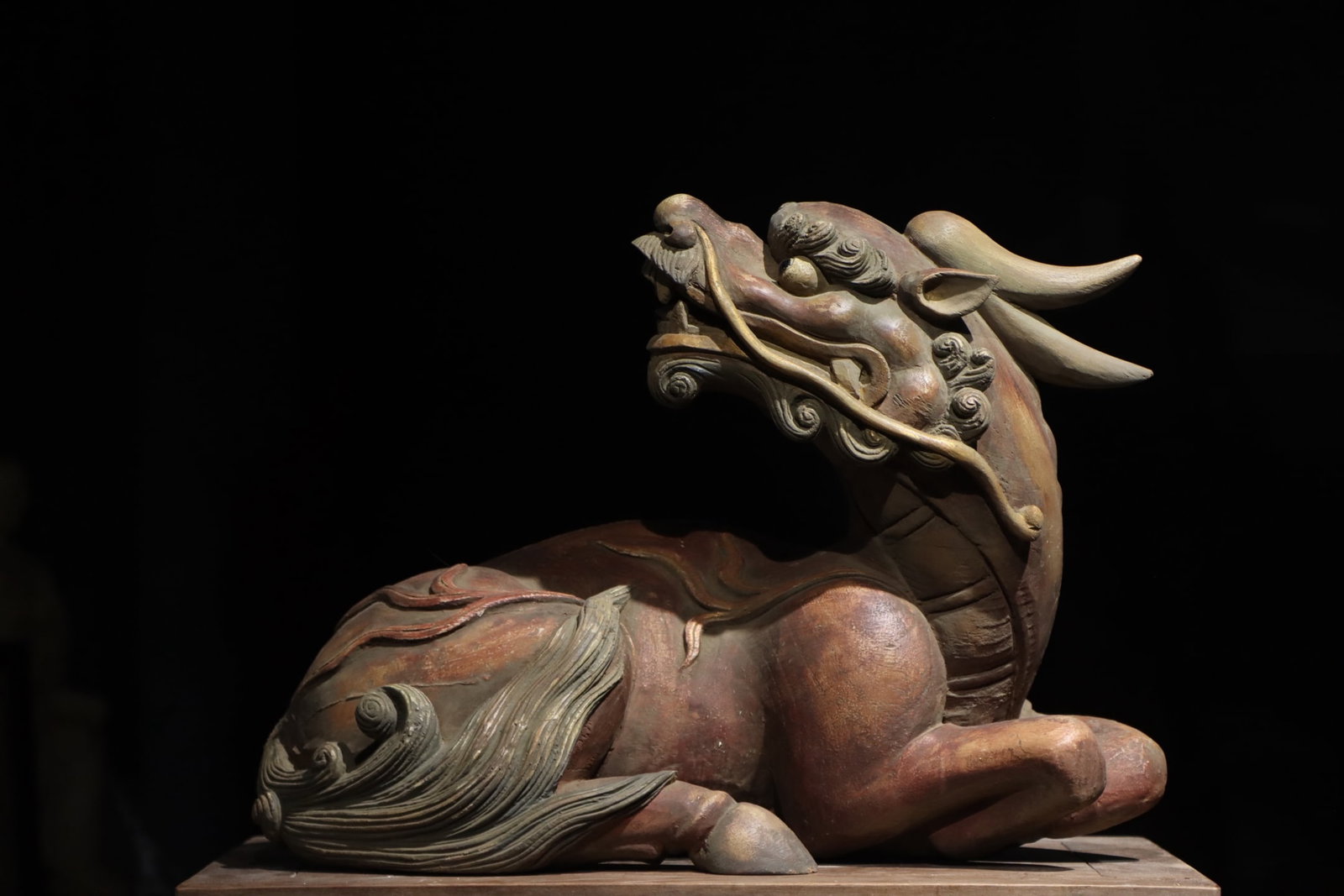 Wood carvings of the Ming Dynasty gilded reclining ox deity beast: Height:41cm(16.14in) Width:56cm(22.05in)Antique wooden lacquered golden mythical ox sculpture, worn aged paint, symbolizing peace, harvest and evil suppression