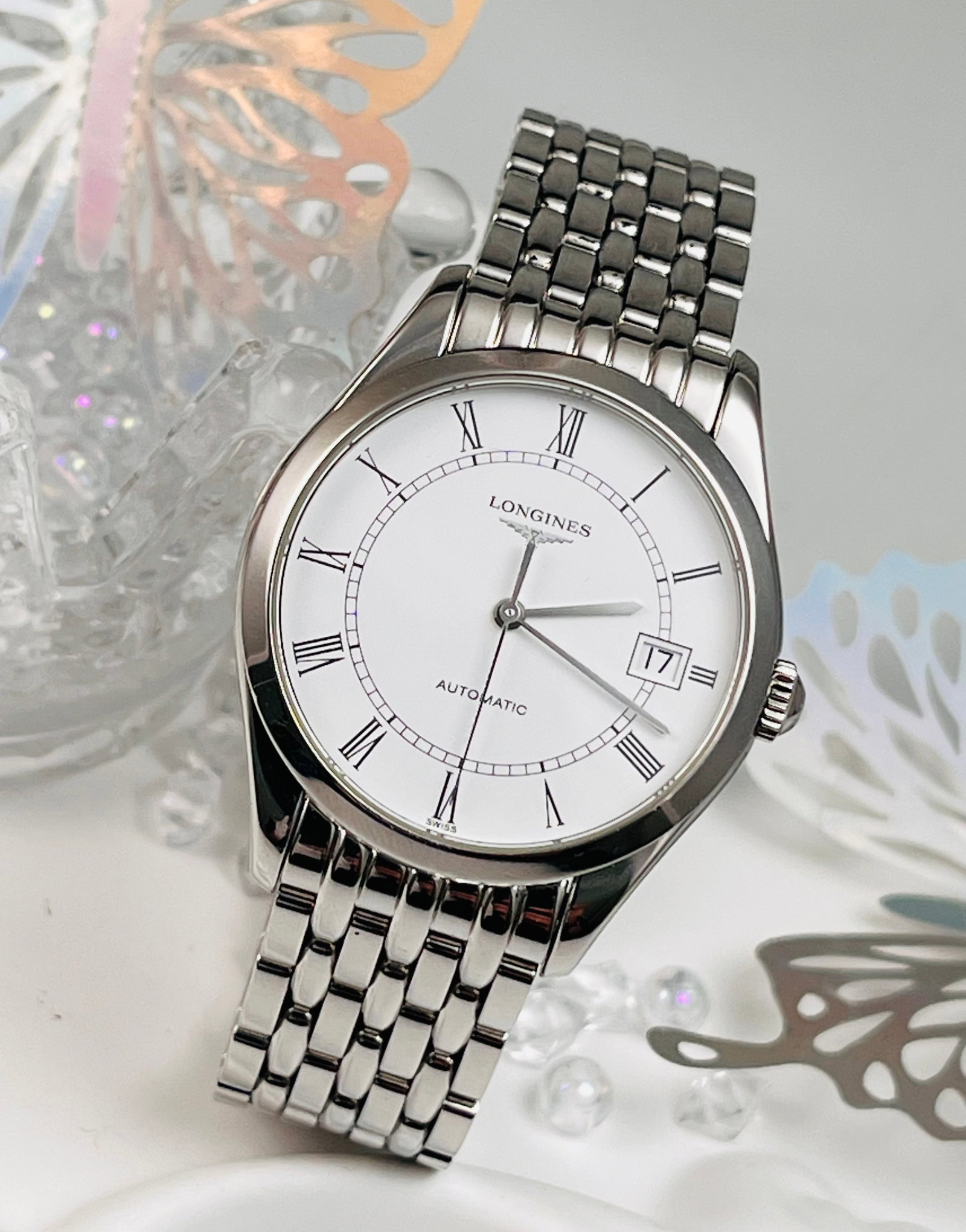 Longines Elegance collection watches: Equipped with an automatic mechanical movement, 36mm stainless steel case, white dial with Roman numerals