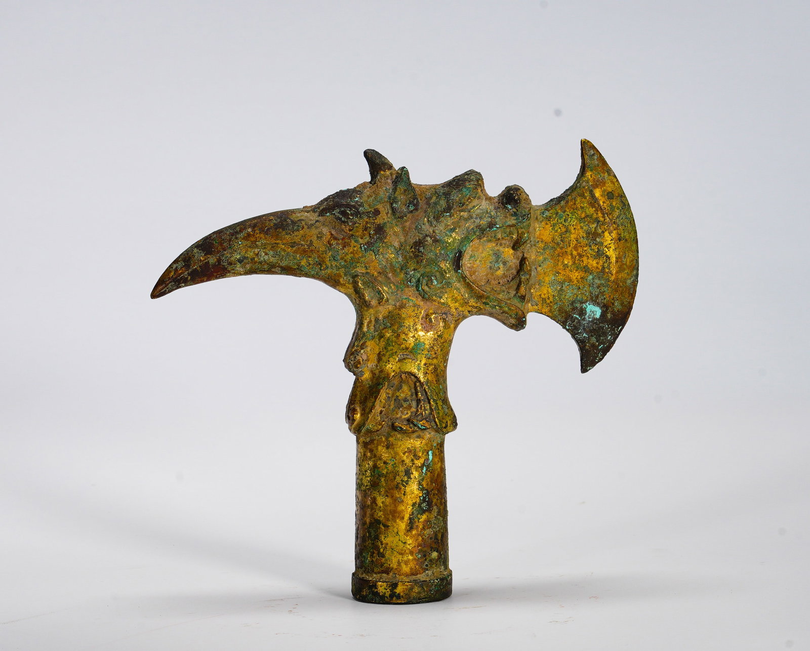 Gilded eagle head and bronze axe and halberd head from the Han Dynasty (1 of 6)