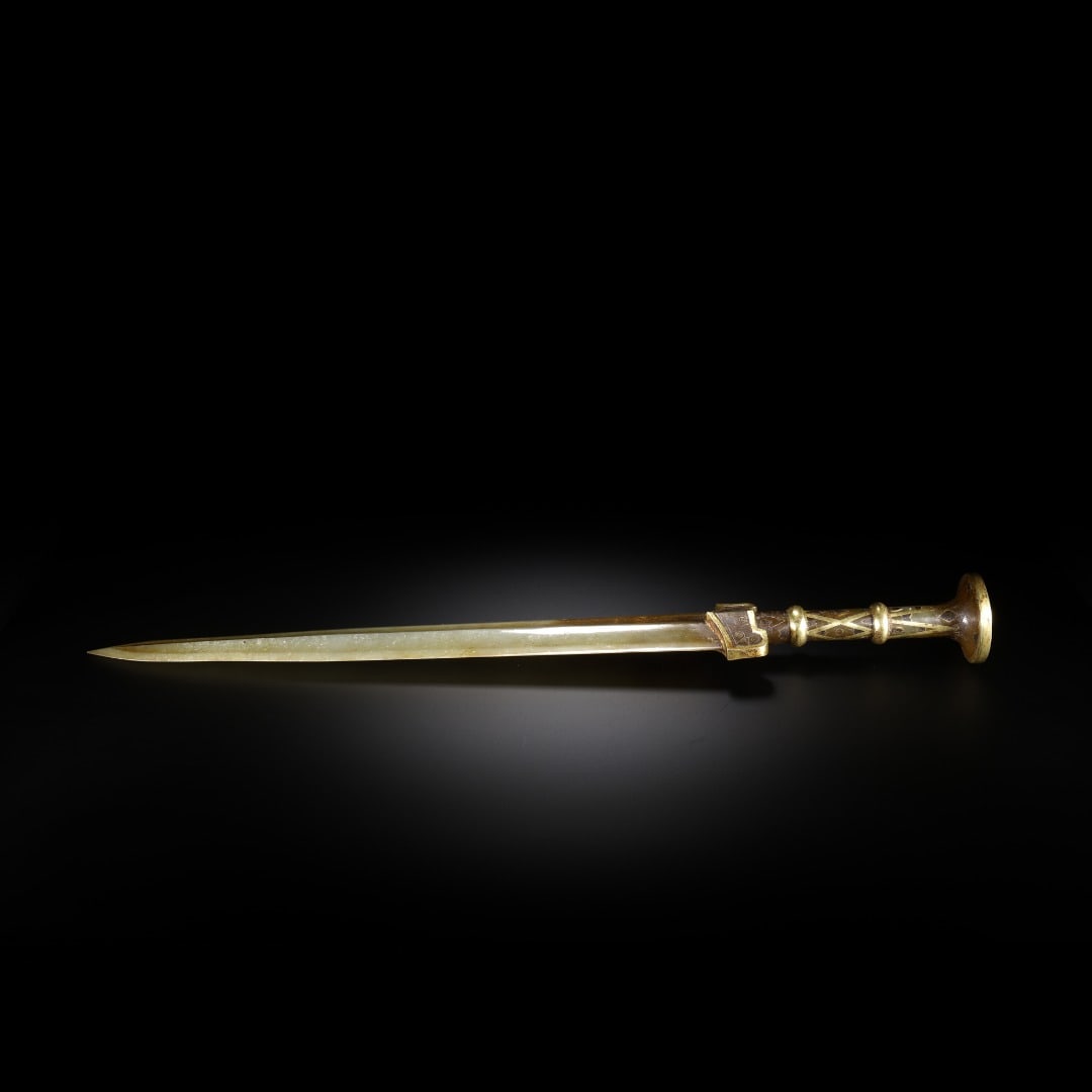 Han Hetian jade poetry and prose Jade swords: Long:16.3cm(6.42in), Width:4.8cm(1.89in), Thick:4.6cm(1.81in), Weight:354g (0.780lb)The blade is carved from solid antique jade with natural patina and mellow aged surface. Modelled after Warring Stat