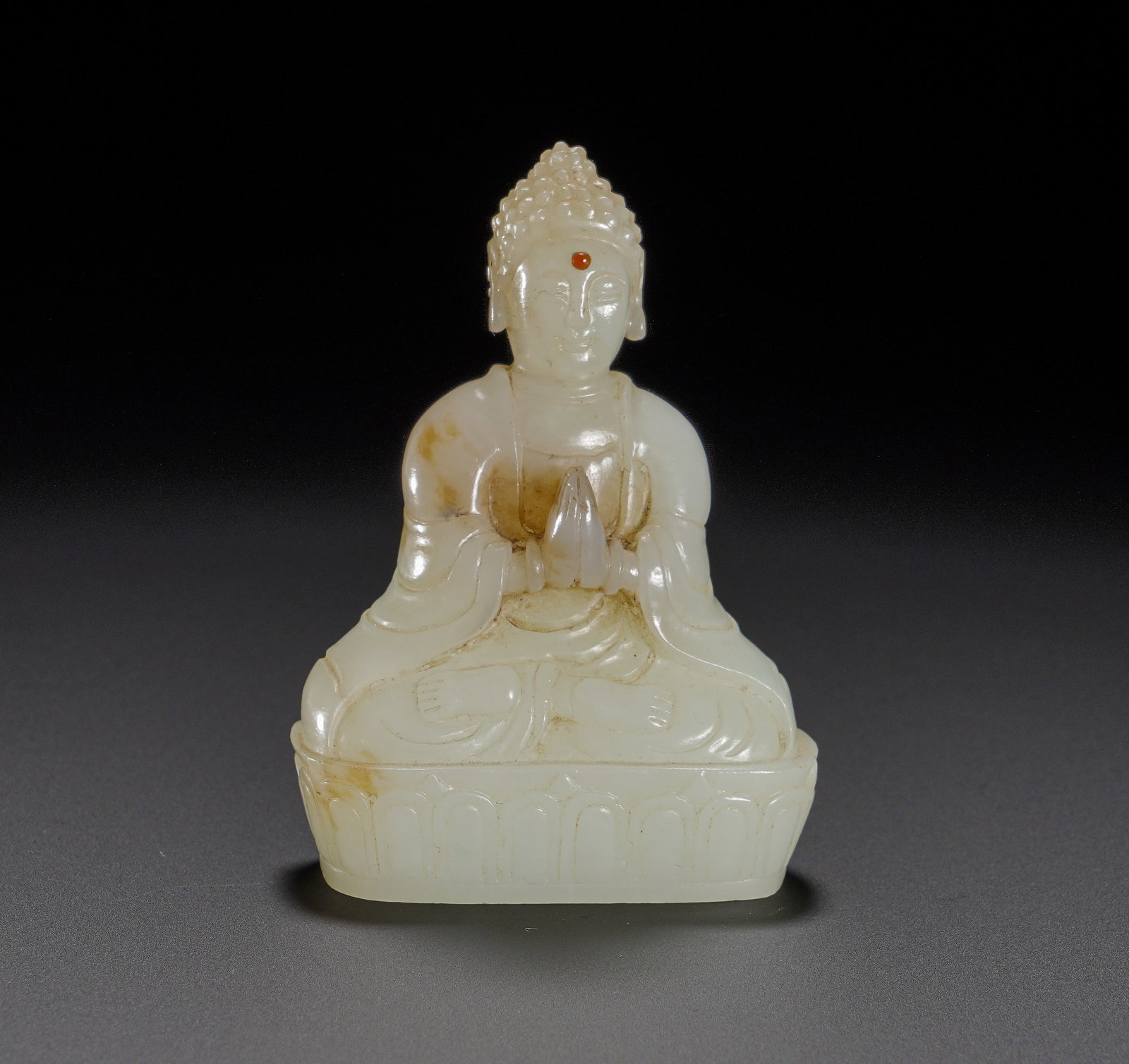A seated Buddha statue of Sakyamuni in Hetian jade from the Qing Dynasty (1 of 9)