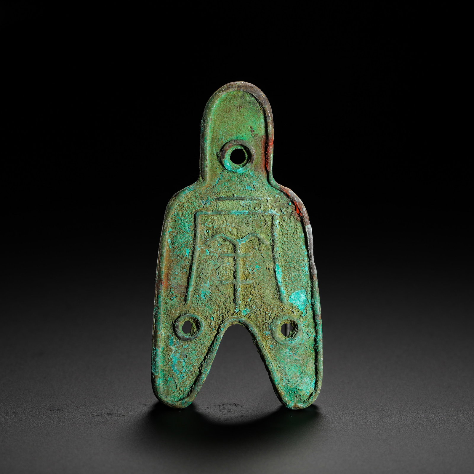 Three Hole cloth Coins of the Warring States period: H:7.2cmW:3.6cmWeight:22g This spade coin was minted during the Warring States Period and served as currency in the Zhao or Zhongshan states. Named "Three-Holed Spade" for its holes at the top and