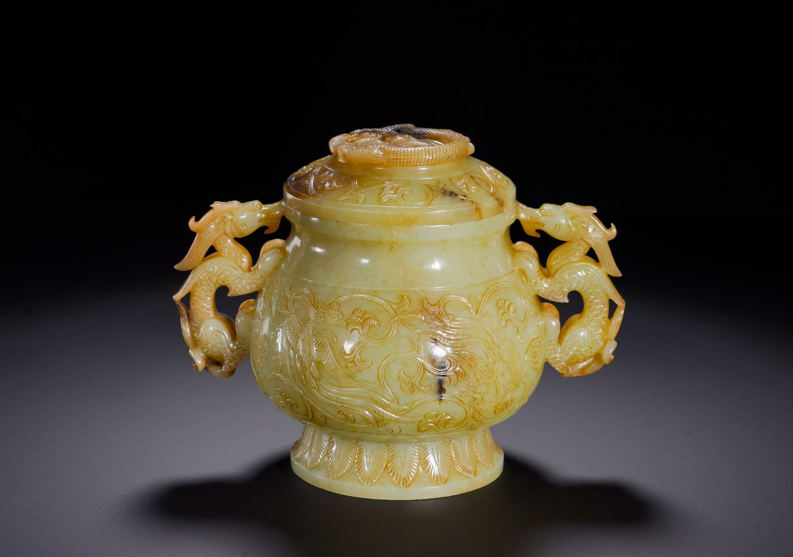 Tang Dynasty Hetian jade double dragon-ear dragon-phoenix pattern covered stove: Height:14cm(5.51in), Width:18.5cm(7.28in), Weight:1000g (2.205lb)Yellow Hetian Jade Censer with Twin-Dragon Handles, Phoenix and Dragon Patterns & CoverCarved from a single block of fine yellow