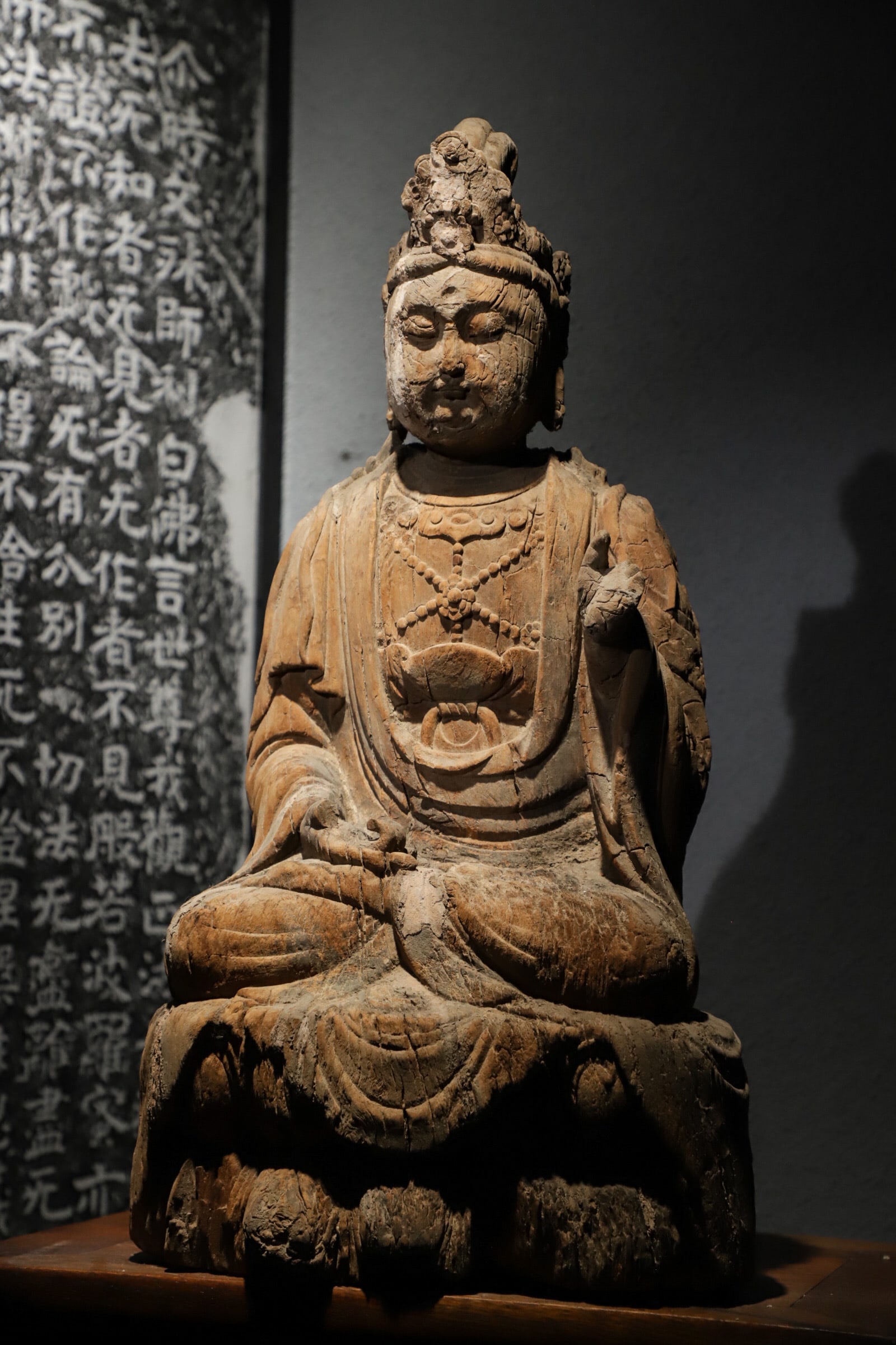 Song Dynasty woodcarving. Statue of Guanyin Bodhisattva: Height:60cm(23.62in), Long:28cm(11.02in), Width:20cm(7.87in)Representative Central Plains wooden Buddhist statue of the Song Dynasty. Departing from the bold grandeur of Tang works, it adopts restrain