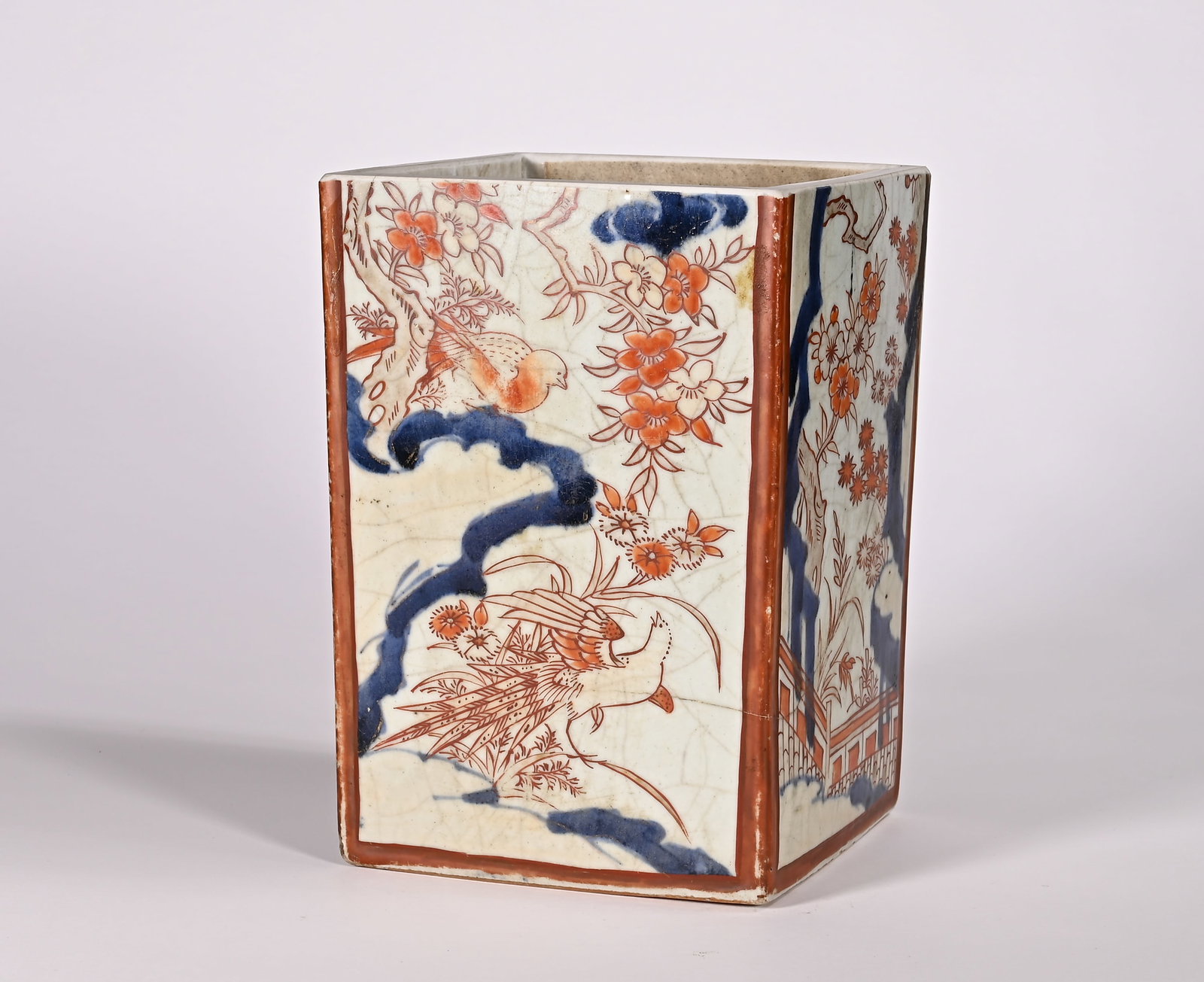 Qing Dynasty blue and white underglaze red pen holder: Height:15.5cm(6.10in), Width:11.2cm(4.41in), Weight:1060g (2.337lb)