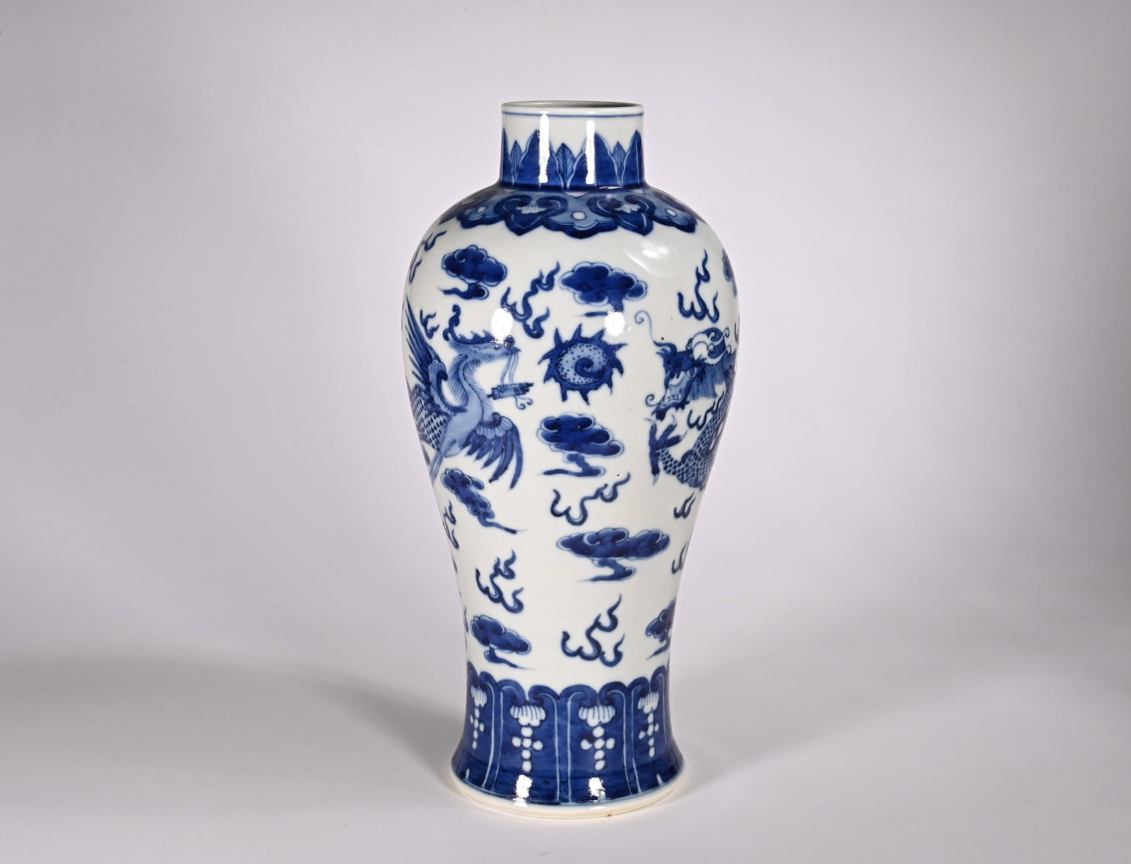 Qing Dynasty blue and white pen holder with dragon and phoenix patterns: Height:32cm(12.60in), Width:14cm(5.51in), Weight:1400g (3.086lb)