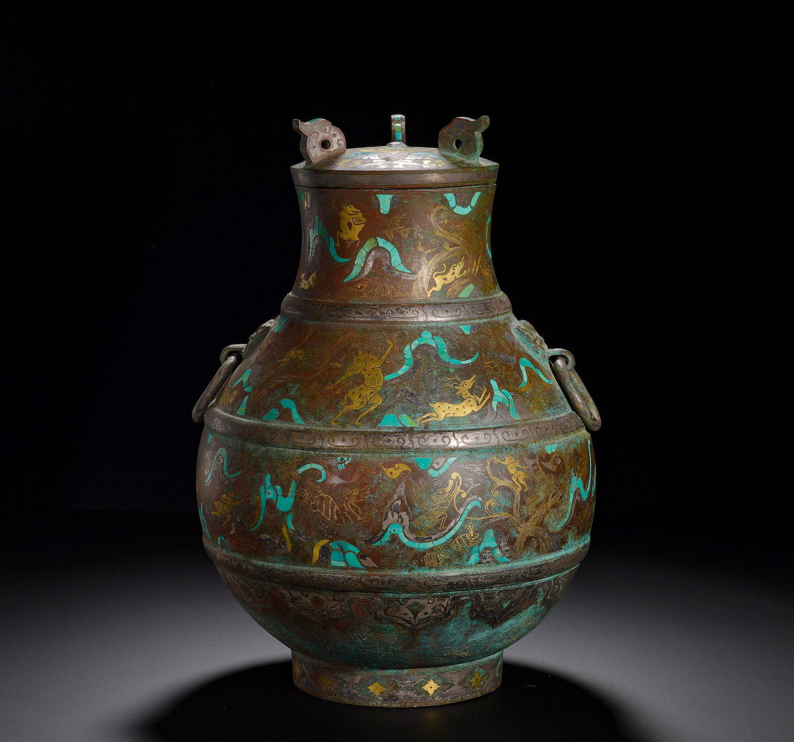 Copper inlaid with gold and silver inlaid with turquoise with animal patterns from the Spring and (1 of 8)