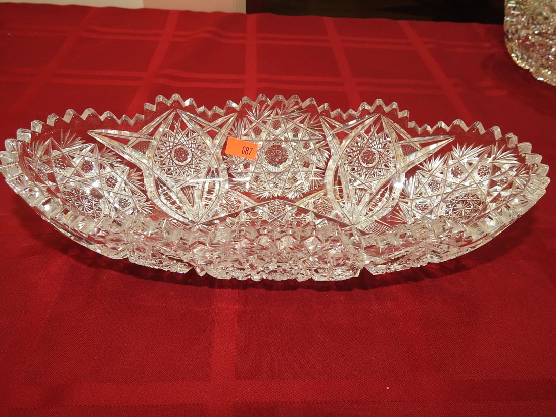 ABP Cut Glass Oval Relish / Celery Tray: American Brilliant Period hand-cut glass oval relish or celery tray with hobstar/fan panels and sawtooth rim. Approx. 11.25 x 5 x 2.5 in. Unmarked unless otherwise noted; maker/pattern attribution is