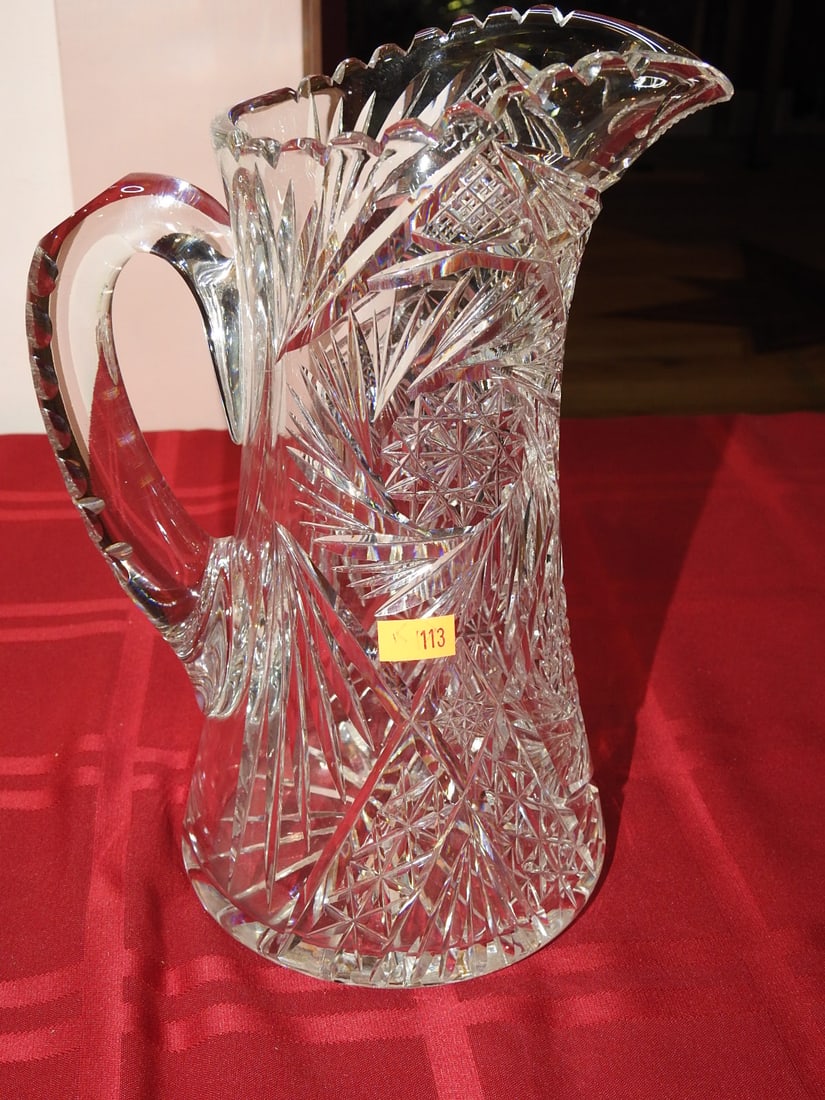 ABP Cut Glass Tankard Water Pitcher: American Brilliant Period hand-cut glass tankard water pitcher with applied handle and geometric cut decoration. Approx. 9.5 x 7 x 5.25 in. Unmarked unless otherwise noted; maker/pattern attribution i