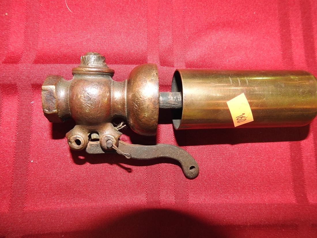 Brass Steam Whistle with Valve Body: Vintage brass steam whistle with valve body and threaded fitting. Approx. 6.5 x 2.25 x 1.5 in. Function not tested. Shows age-related wear, patina, finish wear, oxidation, surface scratches and handli