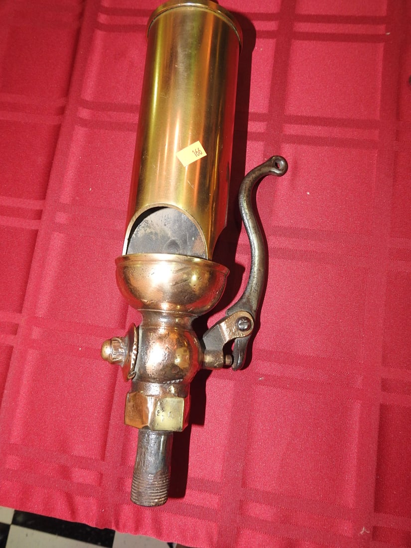 Large Brass Steam Whistle: Large vintage brass steam whistle with valve body and threaded fitting. Approx. 15.5 x 4.5 x 3 in. Function not tested. Shows age-related wear, patina, finish wear, oxidation, surface scratches and ha