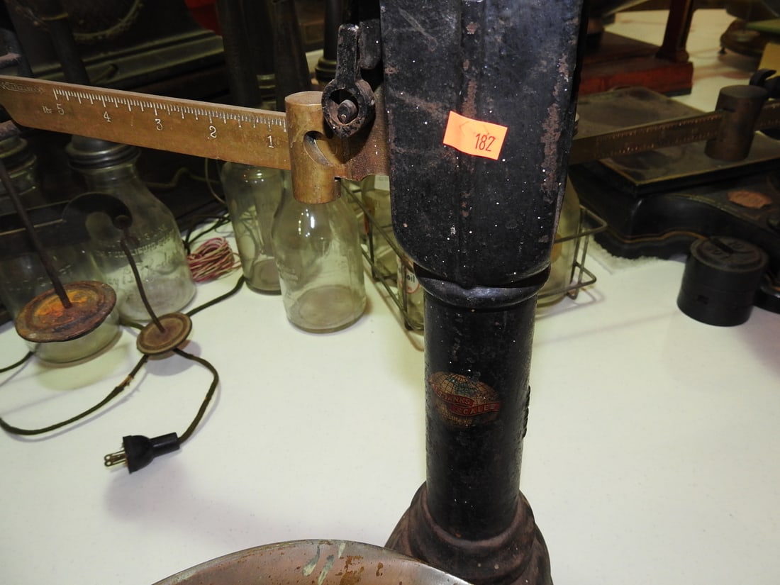 Fairbanks Counter Scale with Pan: Vintage Fairbanks counter scale with metal pan. Pan measures approximately 17 x 9 x 6 in. per notes. Approx. 19 x 22 x 18 in. Mechanical accuracy not verified. Shows age-related wear, patina, finish