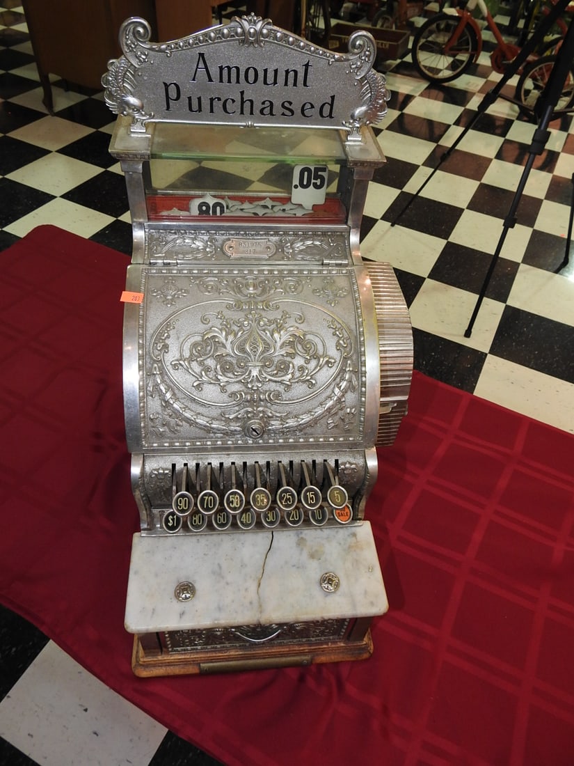 National Cash Register with Marble Top: Vintage National Cash Register Co. register with ornate metal body, original marble top, wooden base and crank/key detail. Approx. 21.5 x 13 x 16 in. Reported functioning, but not independently verifi