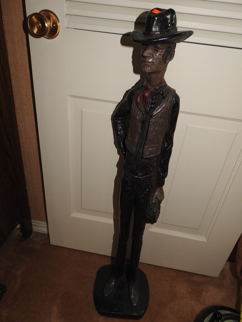 1972 Austin Productions Bronze Sculpture: Bronze 1972 Austin Productions figural sculpture of a man in Western/cowboy attire on round base. Marked Austin Prod. Inc. 1972. Shows surface wear, scuffs, and age-related display wear. Approx. 38 x 
