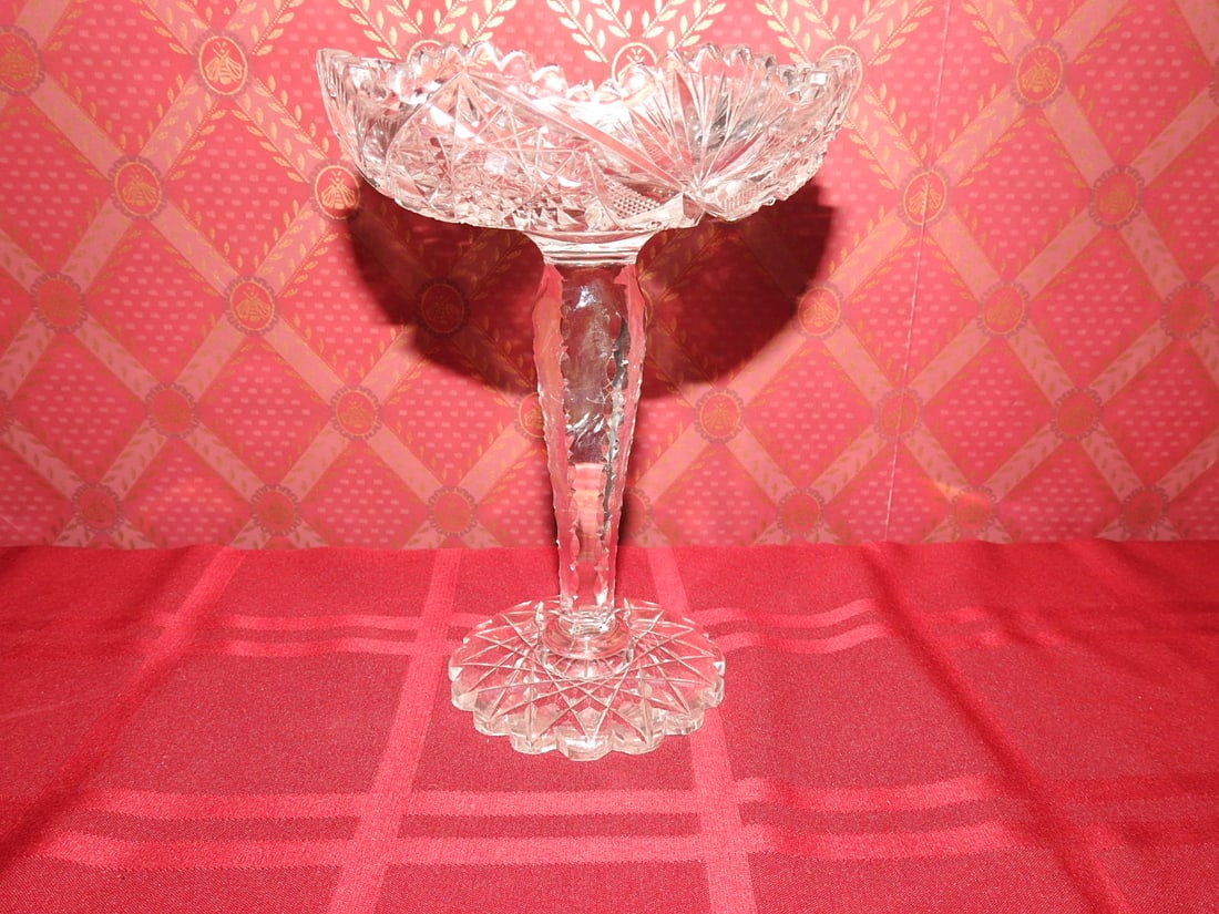 ABP Cut Crystal Handled Basket / Centerpiece: American Brilliant Period style hand-cut crystal handled basket or centerpiece with pedestal stem, scalloped rim and geometric cut panels. Approx. 8 x 6 x 6 in. Unmarked unless otherwise noted;