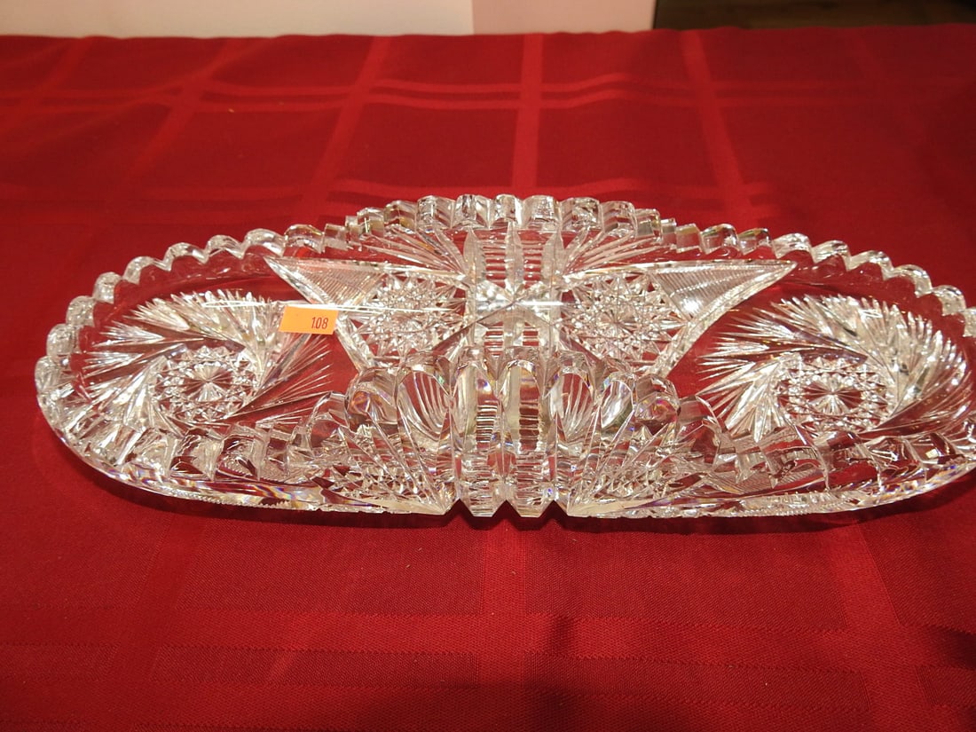 ABP Cut Glass Oblong Celery Tray: American Brilliant Period hand-cut glass oblong celery tray with oval hobstar panels and geometric cutting. Approx. 2.25 x 11.5 x 4.25 in. Unmarked unless otherwise noted; maker/pattern attribution is