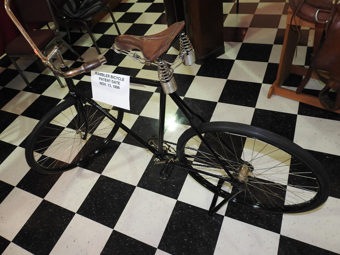 Restored 1891 Rambler City Bicycle: Restored 1891 Rambler city bicycle, model 645, with black frame, tall wheels and period-style saddle/handlebar form. Approx. 47 x 23 x 60 in. Restoration noted on card. Shows display wear, minor
