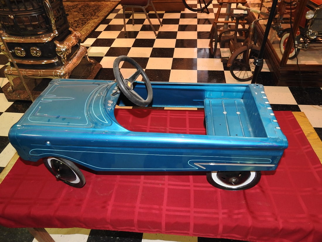 Custom-Painted Ford Falcon Pedal Car: Vintage Ford Falcon pedal car with custom hand-painted accents and graphics. Approx. 18.5 x 14 x 35 in. Chips on passenger side and minor hood chip noted; see photos. Shows paint wear, scratches,