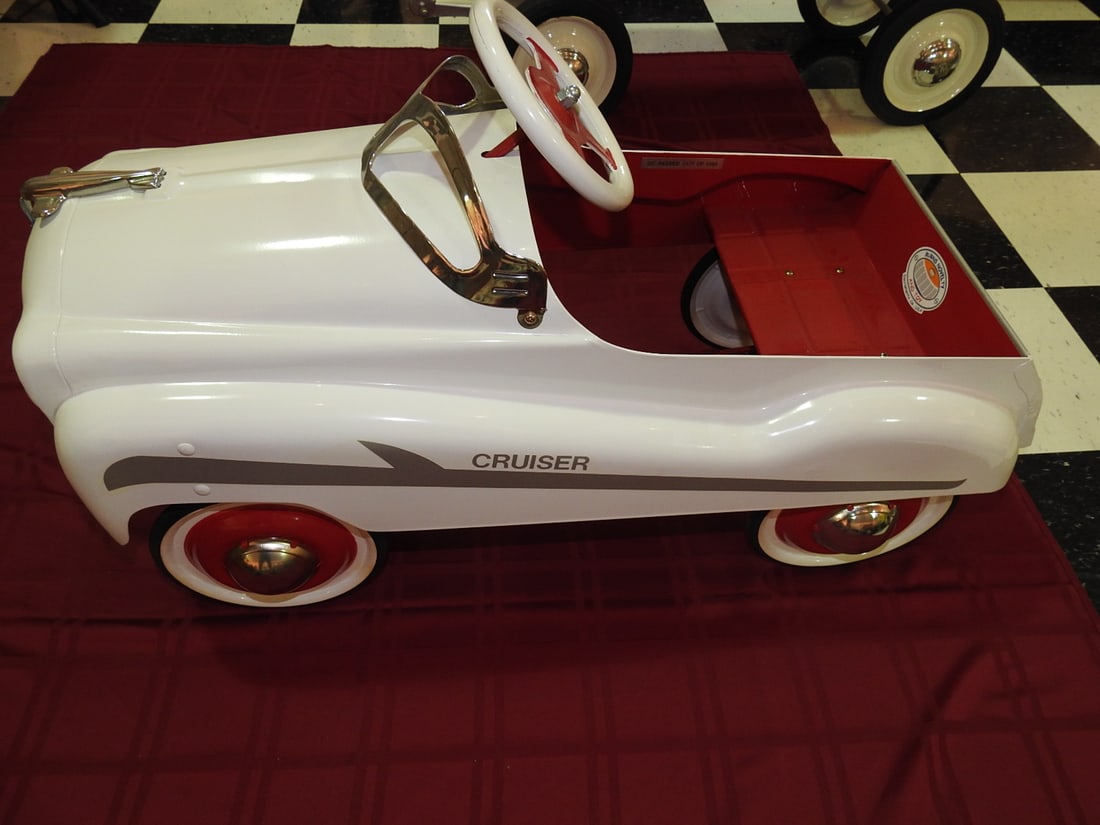 Burns Novelty Limited Edition Glide Ride Pedal Car: Limited edition Burns Novelty GR/Glide Ride pedal car, noted as new and not a reproduction. Approx. 21 x 16 x 35 in. White body with red interior and chrome-style trim. see photos for condition detail