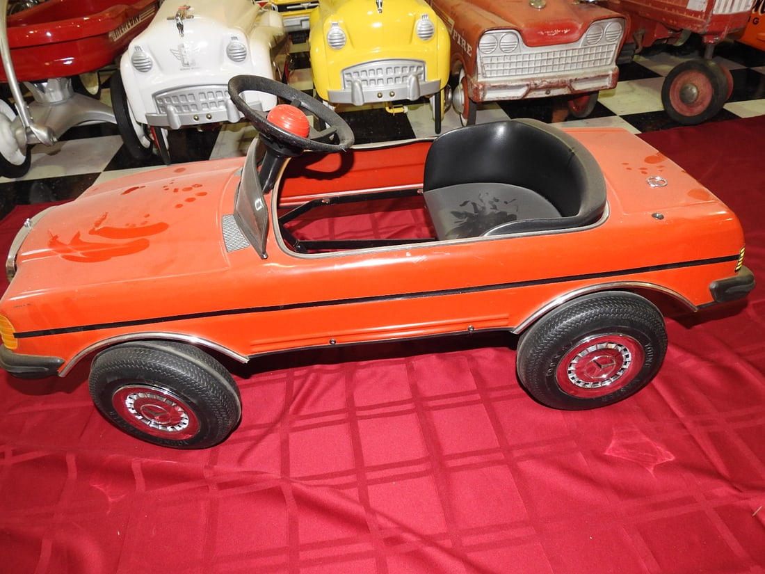 Young Master Mercedes Convertible Pedal Car: Vintage plastic Mercedes convertible pedal car by Young Master, with plate 2300 and rear plate 500 SEC noted. Approx. 18 x 17 x 39 in. Shows surface scratches, scuffs, trim wear and age-related handli