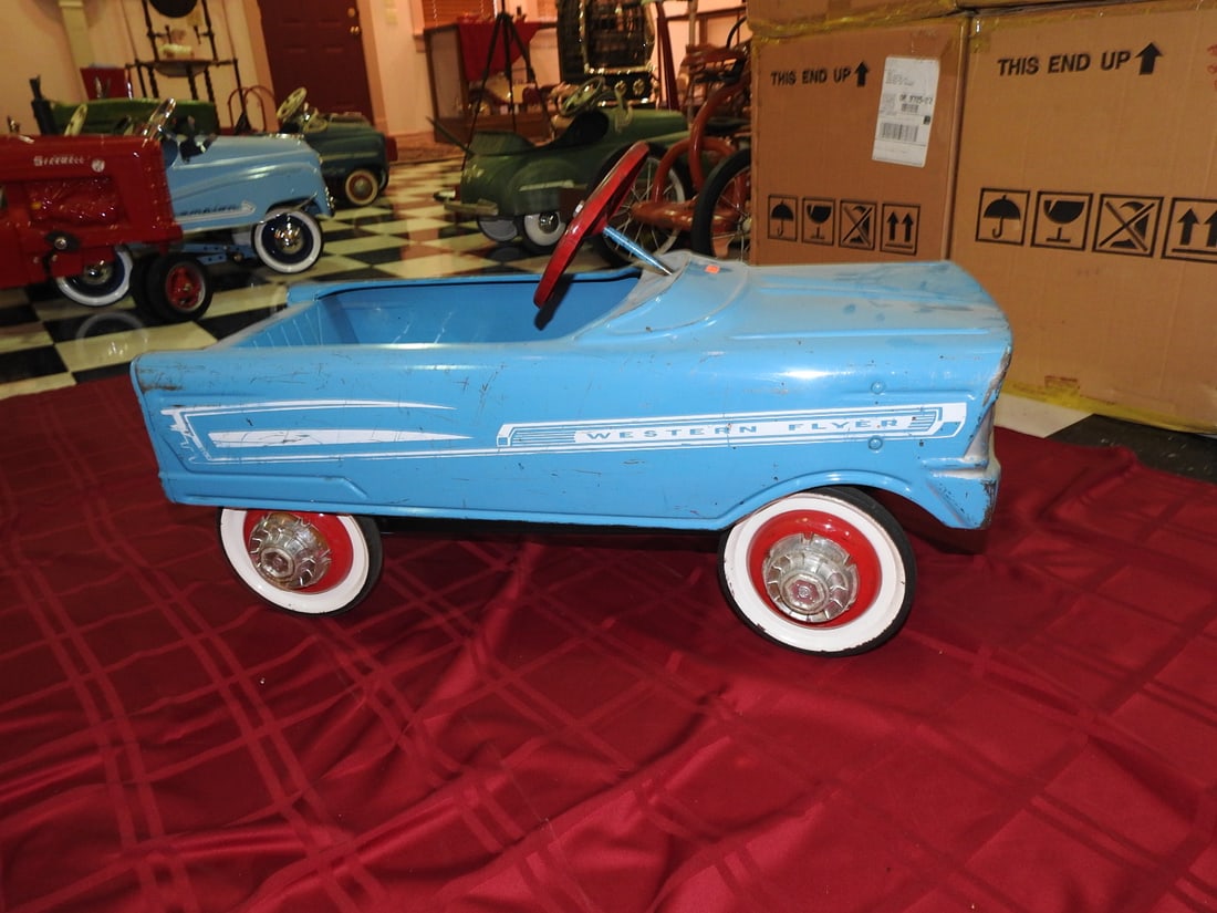 1960 Western Flyer Pedal Car: Vintage 1960 Western Flyer pedal car with original paint and age-appropriate wear. Approx. 18 x 15.5 x 31 in. Shows paint wear, scratches, scuffs, oxidation and tire/wheel wear consistent with age and