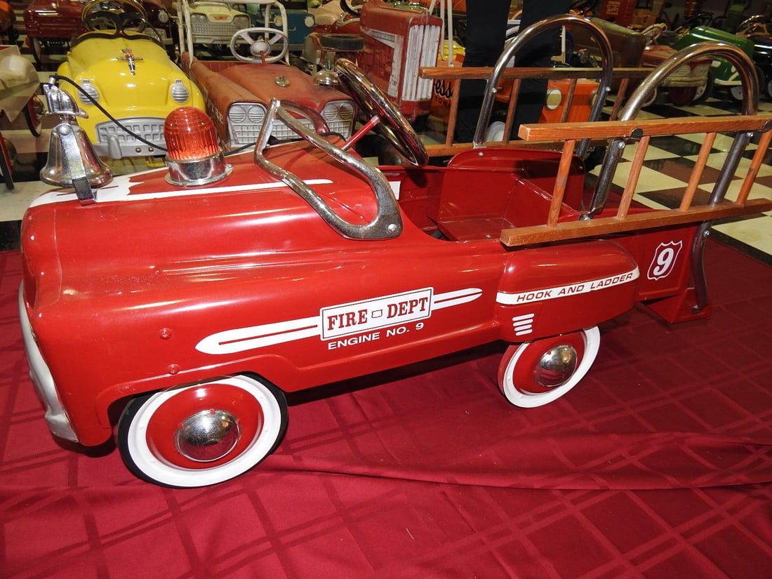 Limited Edition Fire Dept. Engine No. 9 Pedal Car: Limited edition Fire Dept. Engine No. 9 pedal car. Approx. 24 x 16 x 46 in. Two tires are not installed per notes; see photos if present. Shows light display/handling wear and any noted loose parts ar