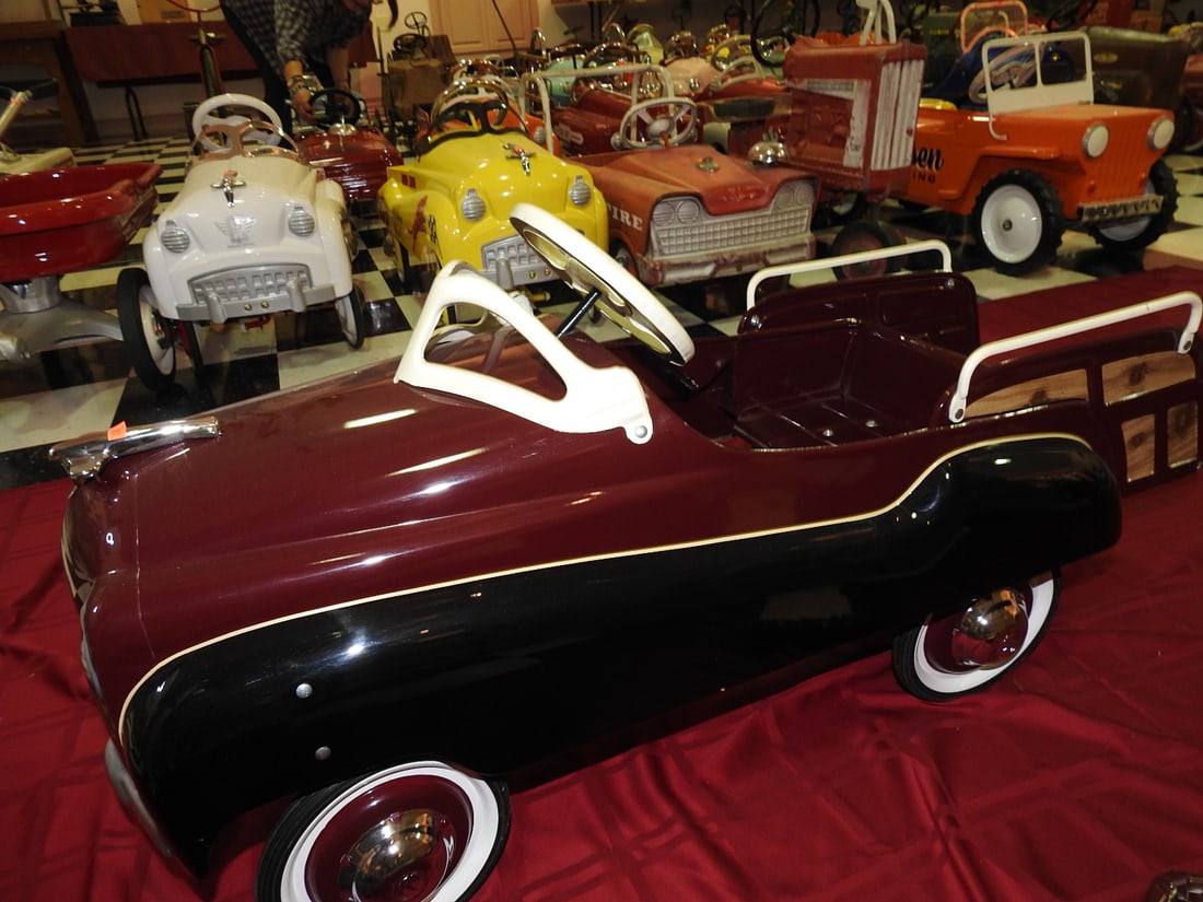Giordani 1951 Studebaker Pedal Car: Limited edition/newer 1951 Studebaker pedal car by Giordani with detachable upholstered seat. Approx. 20 x 16 x 40 in. Noted as new. Shows light display/handling wear; see photos for condition
