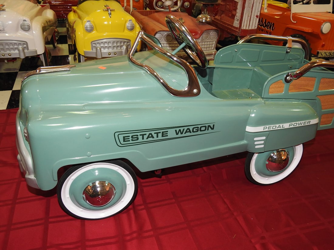 1950s Murray Sad Face Estate Wagon Pedal Car: Vintage 1950s Murray Sad Face Estate Wagon pedal car in turquoise/blue with wood-look side panels. Approx. 21 x 16 x 43 in. Shows paint wear, scratches, scuffs, oxidation, tire wear and age-related