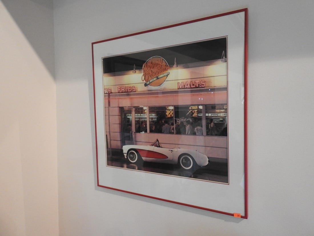 Framed Johnny Rockets Original Hamburgers Diner Print: Framed Johnny Rockets Original Hamburgers diner-themed print with retro restaurant/storefront subject matter. Approx. 24.5 x 24.5 x 1 in. Frame and print show display wear, surface marks, dust and bac