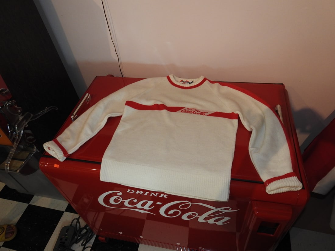 Vintage Coca-Cola Sweater, Size Medium: Vintage Coca-Cola sweater, size Medium per notes, displayed/measured as boxed or folded. Approx. 14 x 18 x 1 in. see photos for condition details.