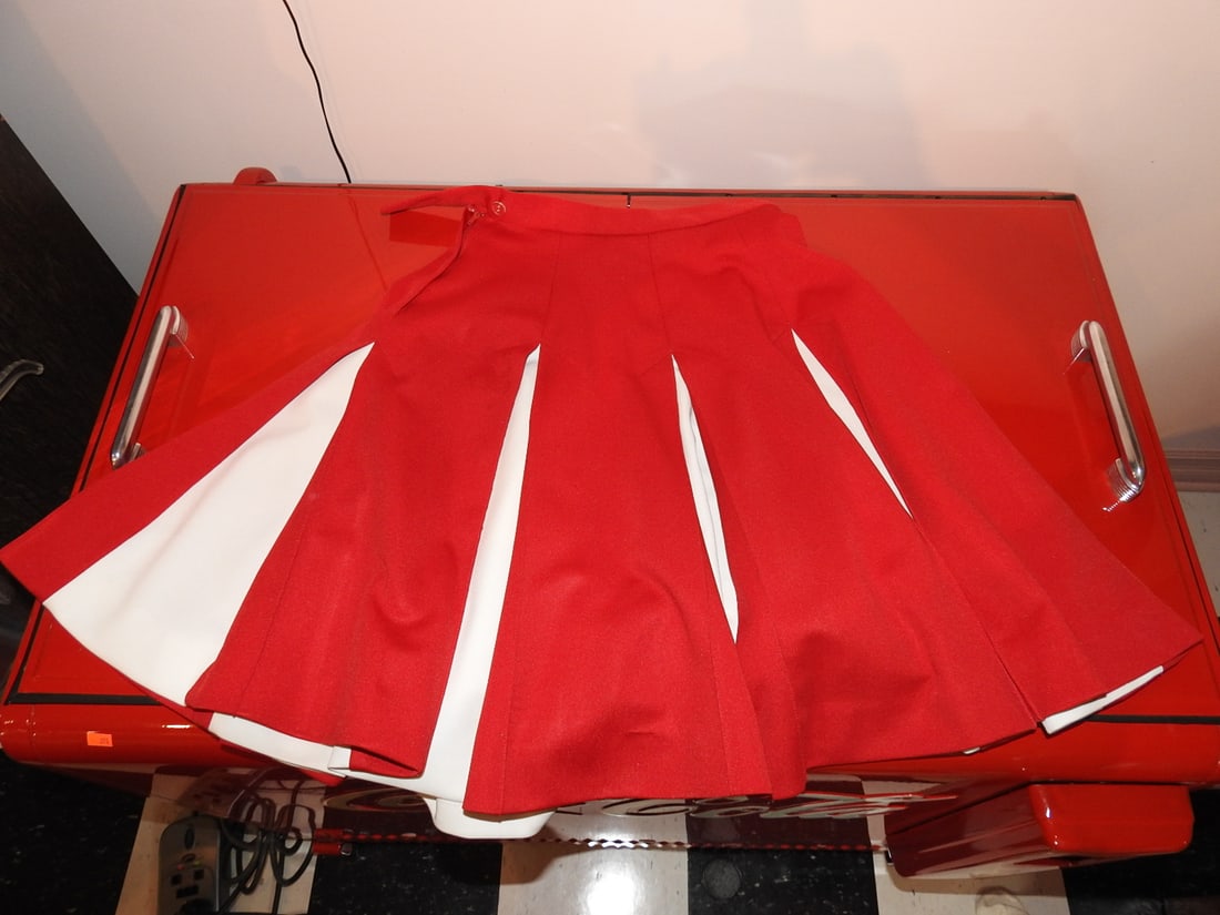Vintage Red and White Cheerleader Skirt: Vintage red and white cheerleader skirt with pleated styling. Approx. 13 x 14 x 1 in.; see photos for condition details.