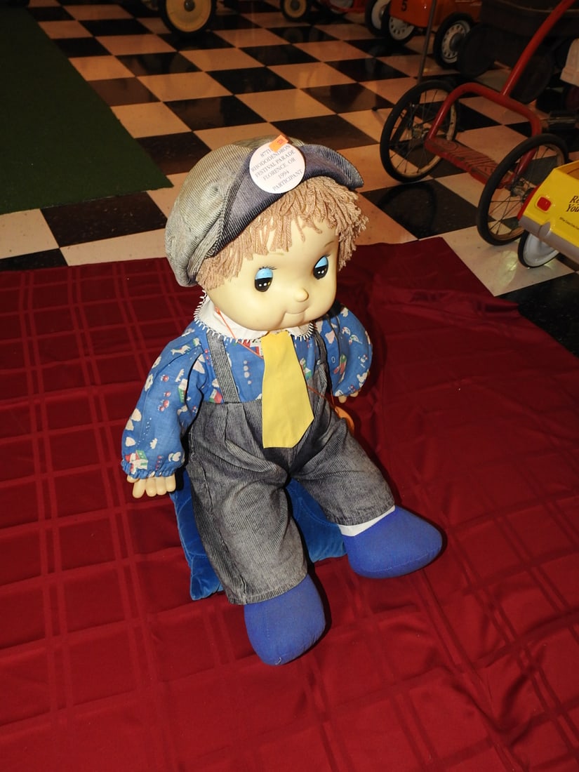 Handmade Rag Doll: Handmade rag doll with soft fabric body and handmade folk-art presentation. Approx. 24 x 18 x 18 in. Textile shows age/display wear, possible fading, stains, loose stitching or storage wear; see