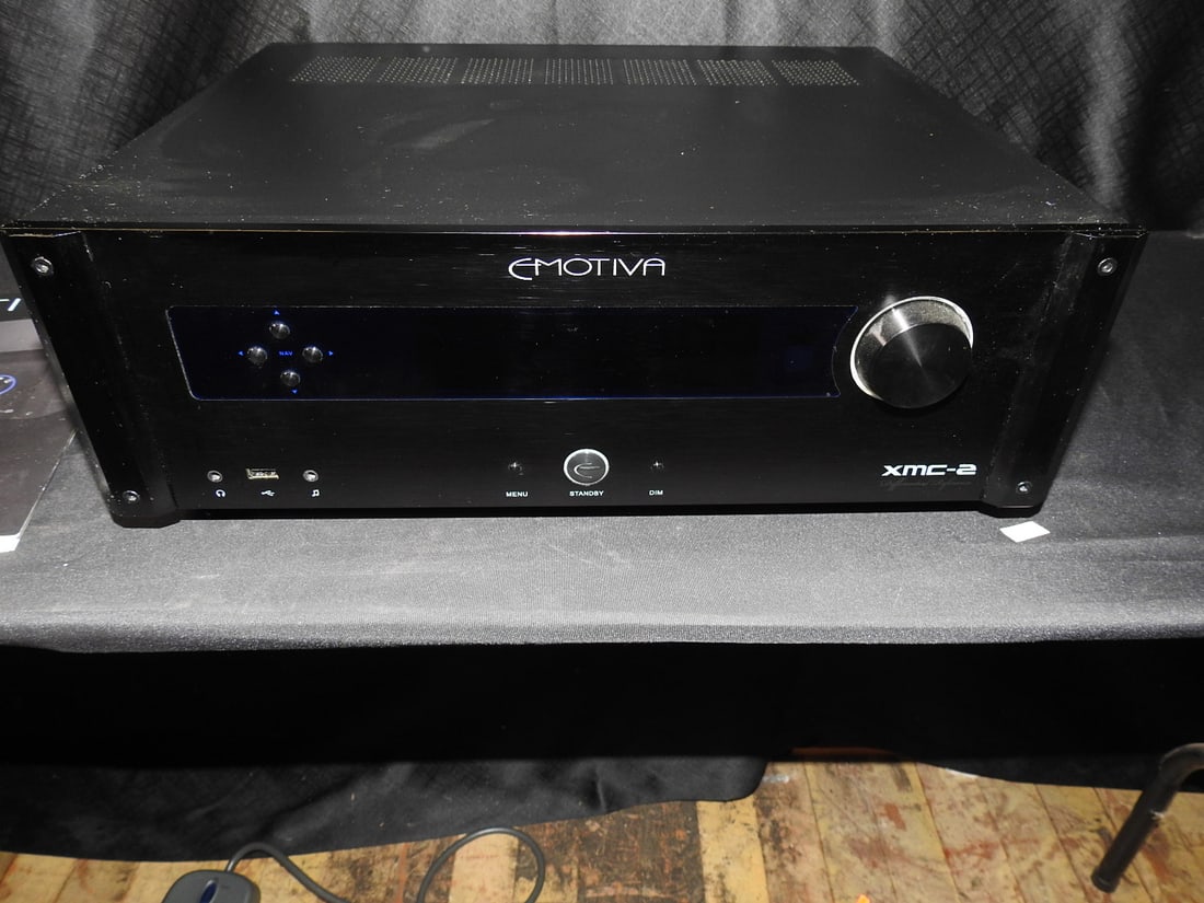 Emotiva XMC-2 Cinema Processor: Emotiva XMC-2 16-channel cinema processor with manual and remote. Tested and functional. Power cord not included. Approx. 6 H x 17 W x 14 D in.