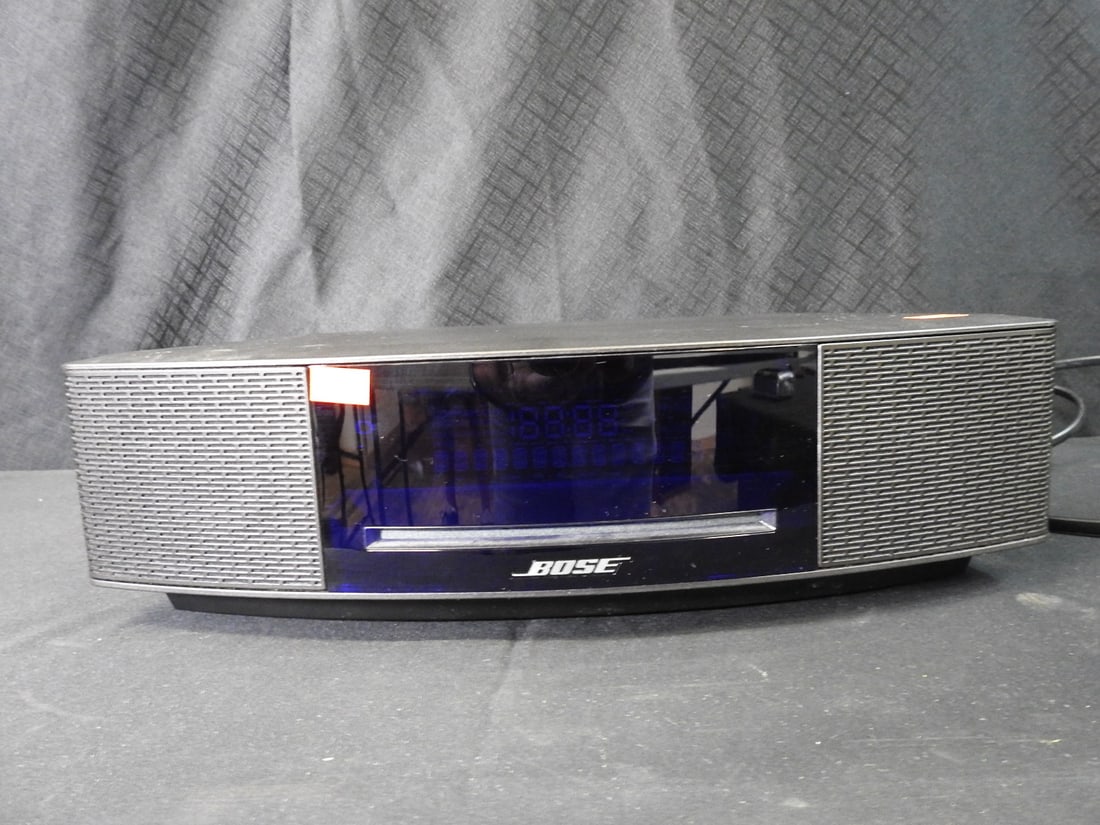 Bose Wave Music System IV: Bose Wave Music System IV with power cord. No remote included. Tested and working. Approx. 4 H x 14.5 W x 9 D in.