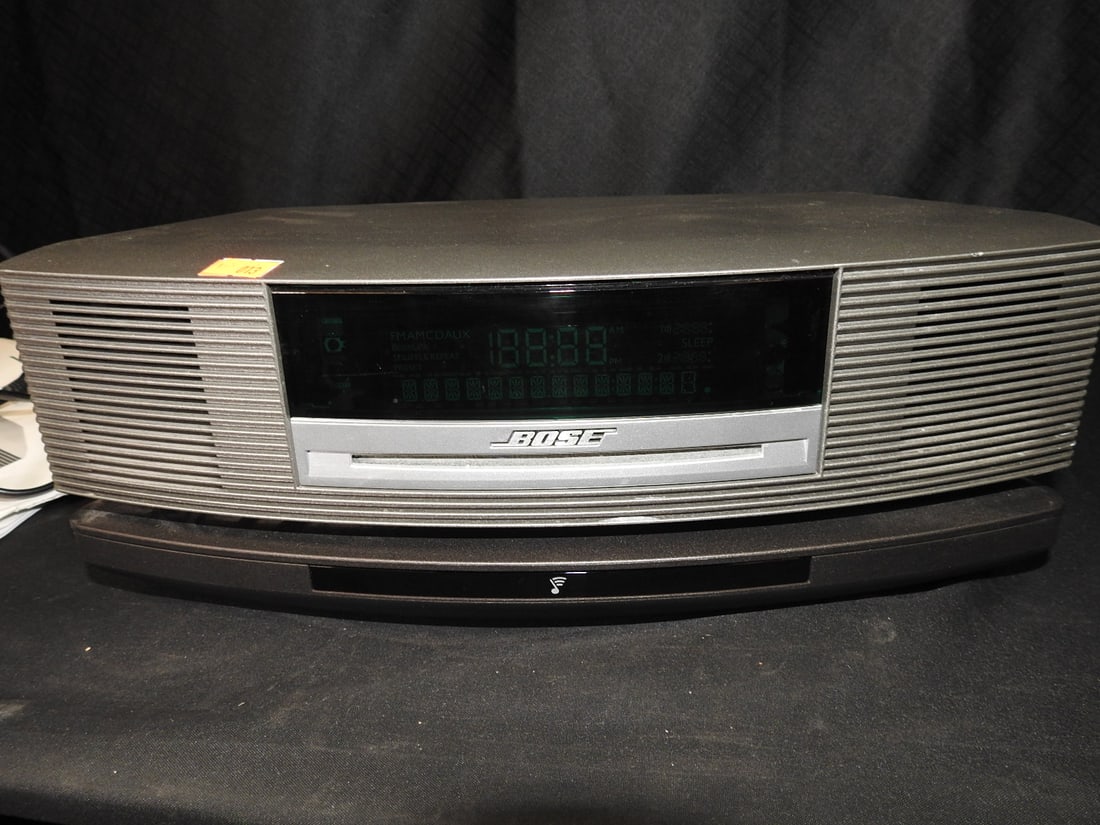 Bose Wave Music System with Manuals: Bose Wave Music System with power cord and manuals. No remote. Tested and working. Approx. 5 H x 14.5 W x 9 D in.