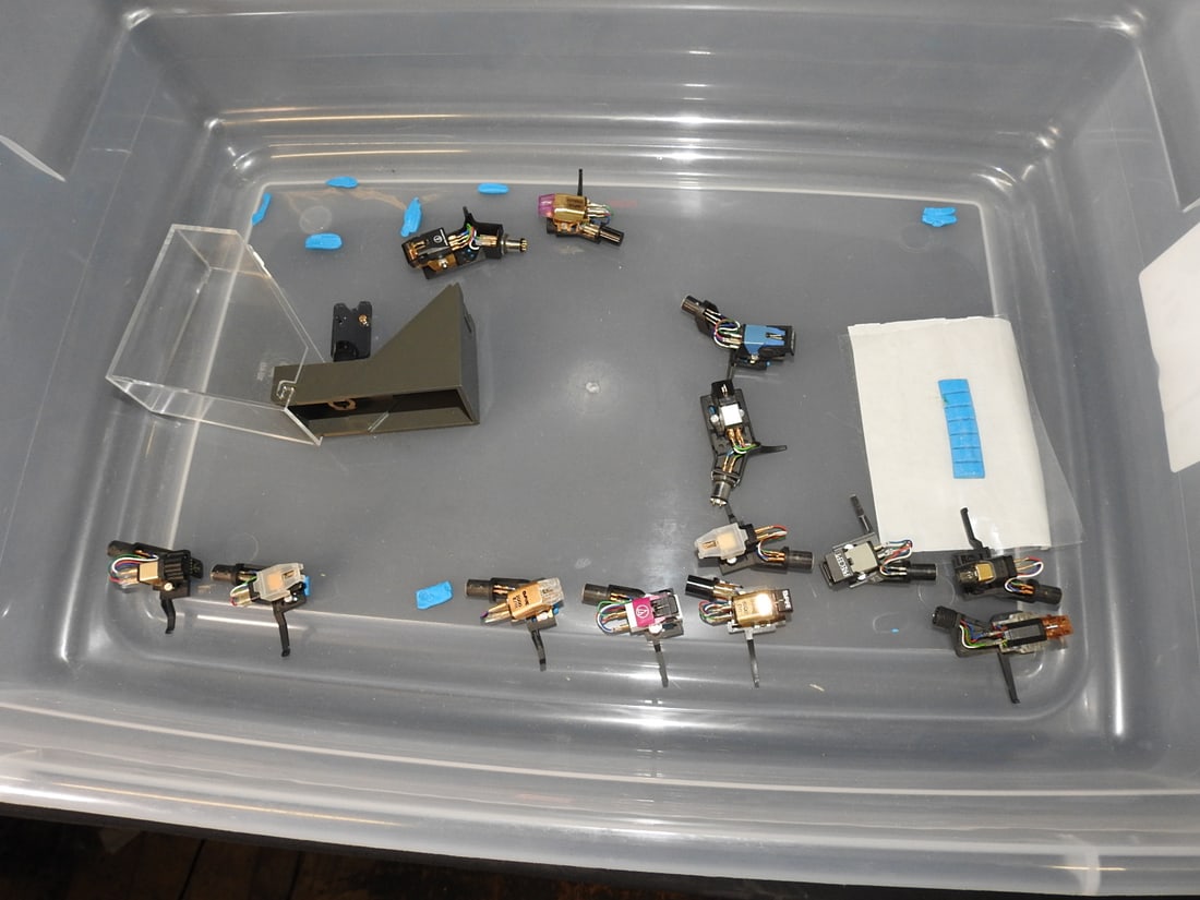 Mixed Lot of Phono Needles: Mixed lot of approximately one dozen record player needles/cartridges. Untested assorted lot. Approx. 5.5 H x 23 W x 16 D in.